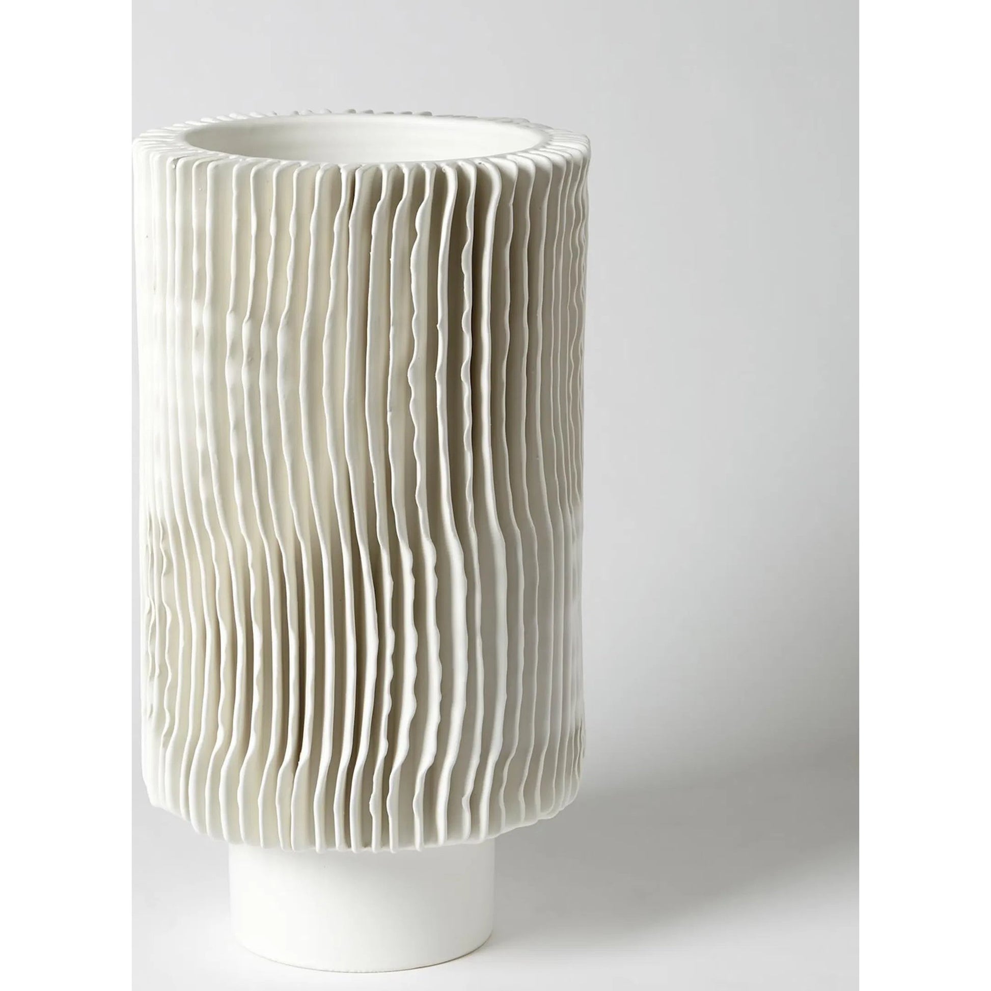 Radiator Vase by Global Views. Made from ceramic in a coastal style.