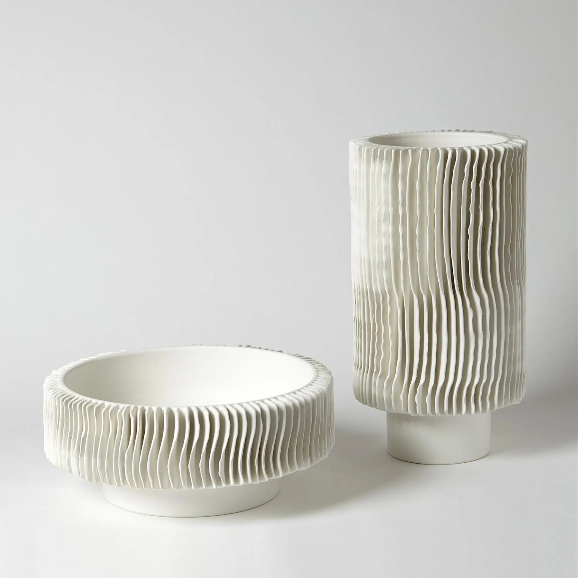 Radiator Vase by Global Views. Made from ceramic in a coastal style.