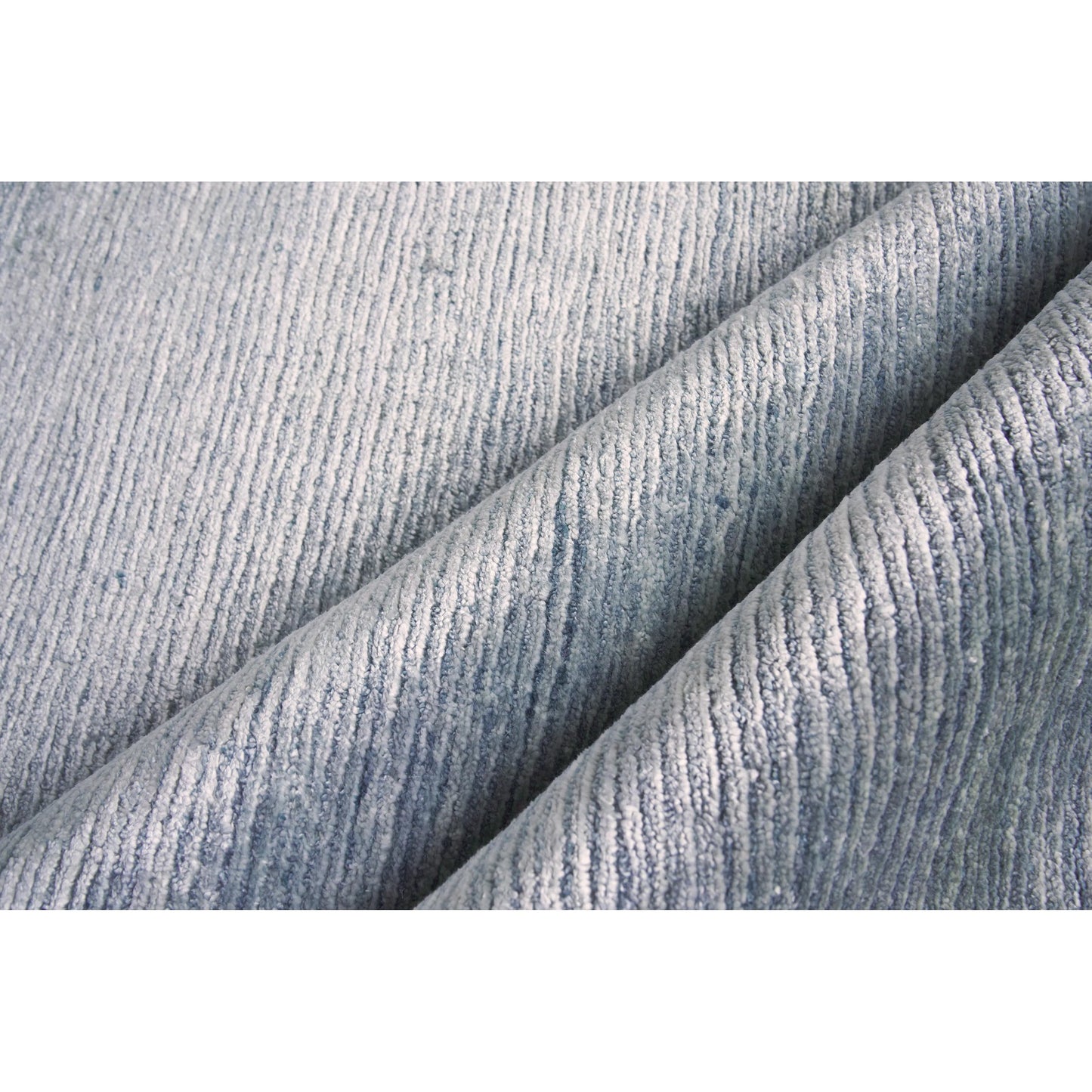 047 SI-1827863,SI-1827864 | Closeup | Crush Rug by Exquisite Rugs. Made from bamboo silk in a unique style.