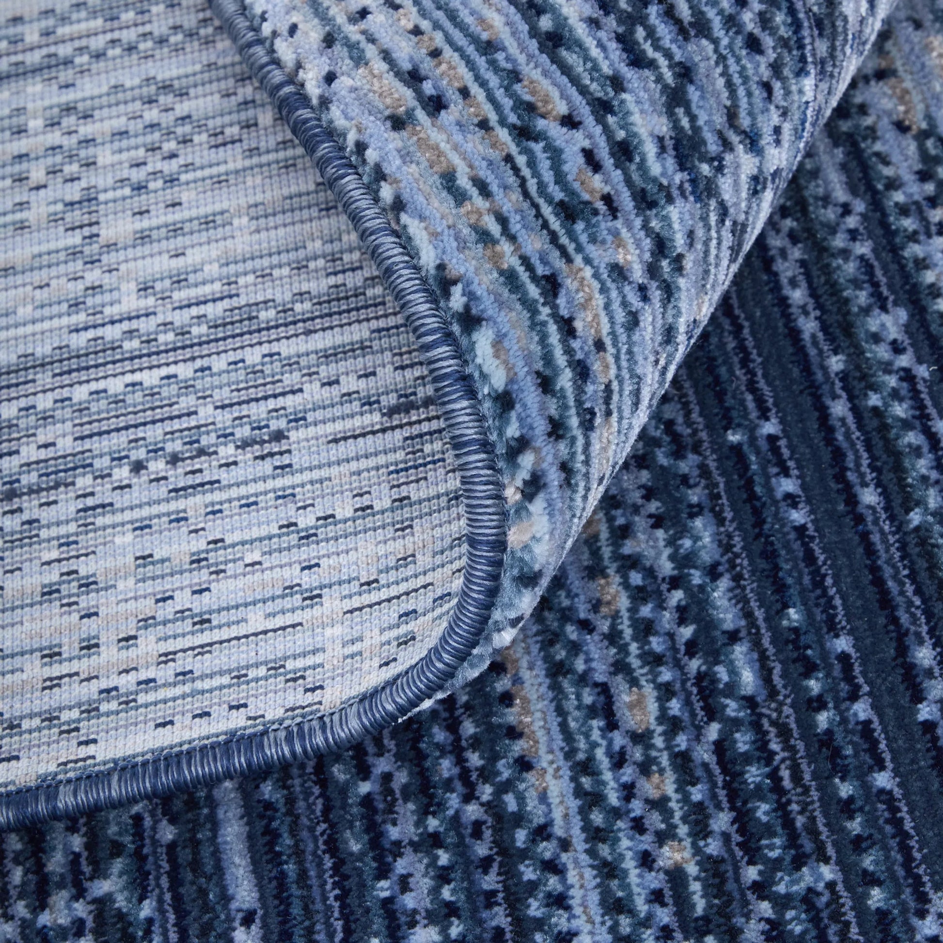 Deja Solid Rug - DJA39PJF by Feizy. Made from polypropylene, polyester in a unique style.