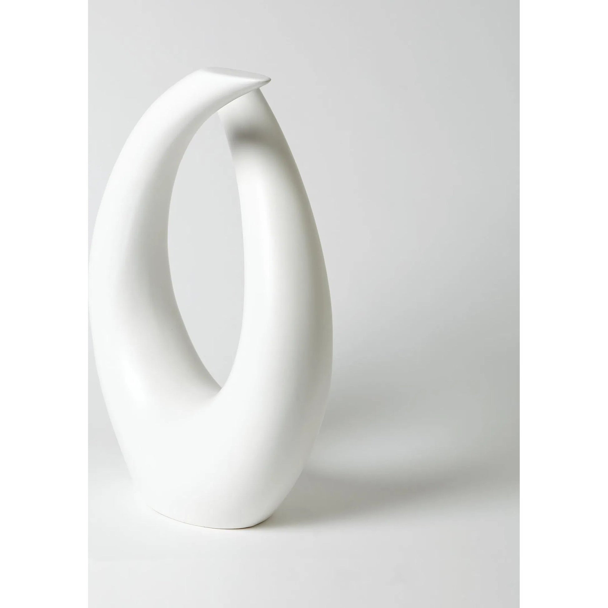 Loop Sculpture by Global Views. Made from ceramic in a modern style.
