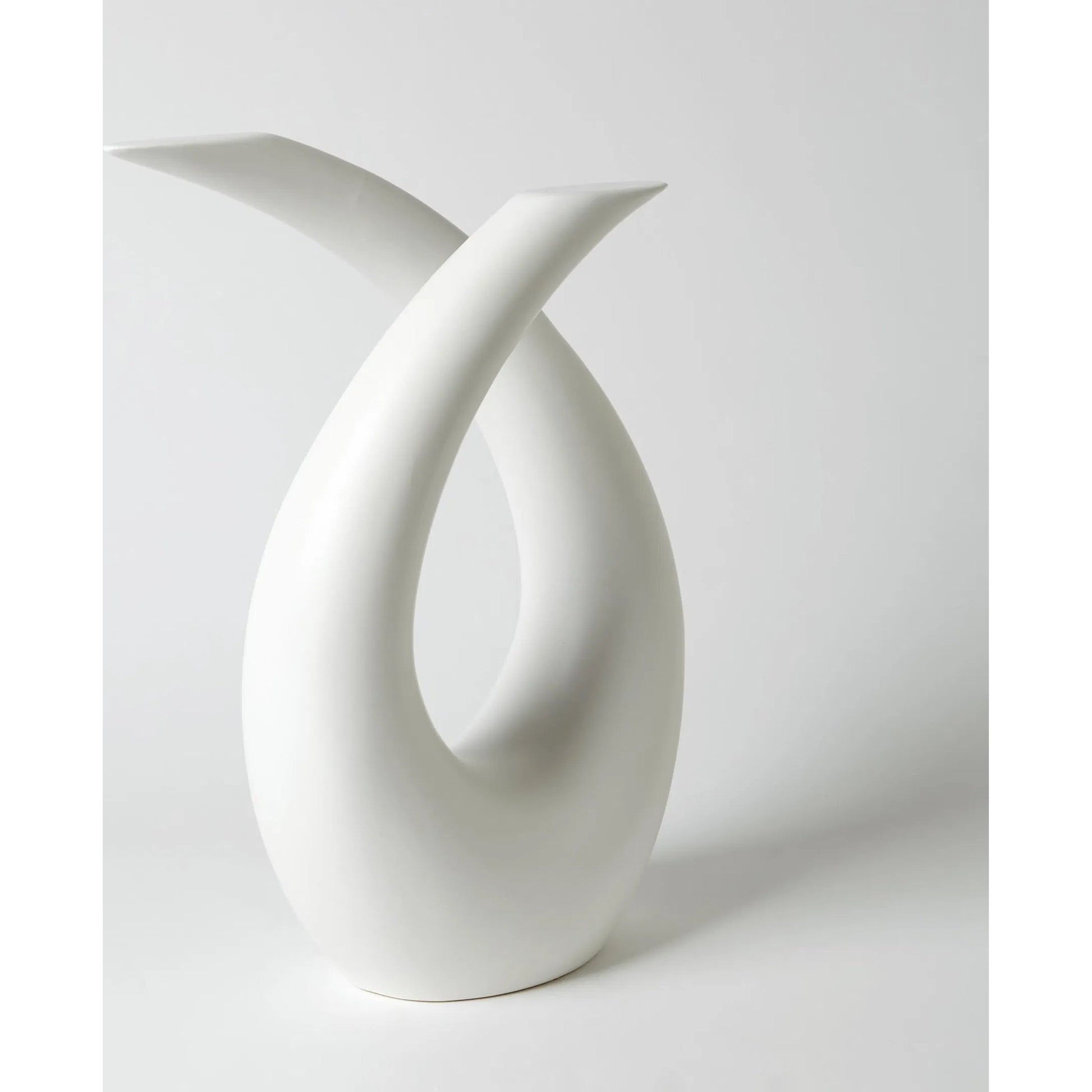 Loop Sculpture by Global Views. Made from ceramic in a modern style.