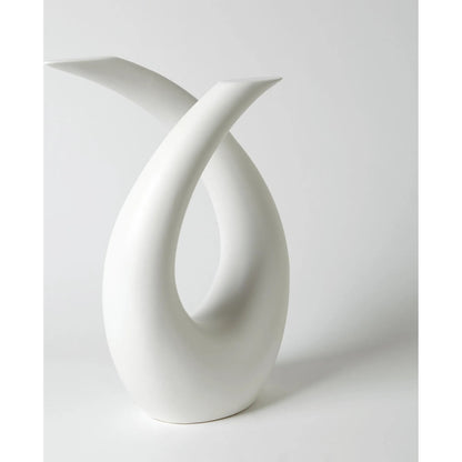 Loop Sculpture by Global Views. Made from ceramic in a modern style.