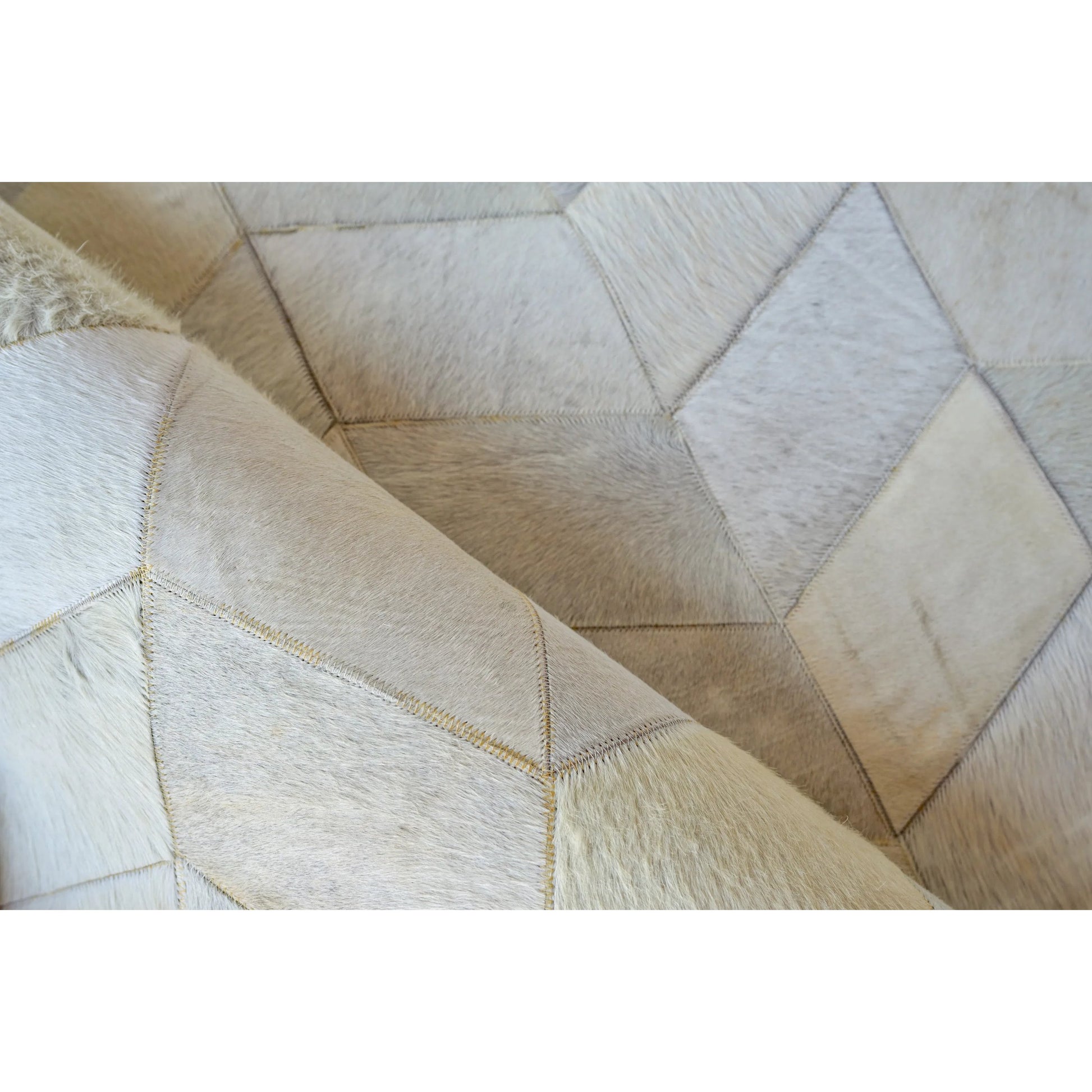 Natural Hide Rug by Exquisite Rugs in ivory. Made from leather hide in a unique style.