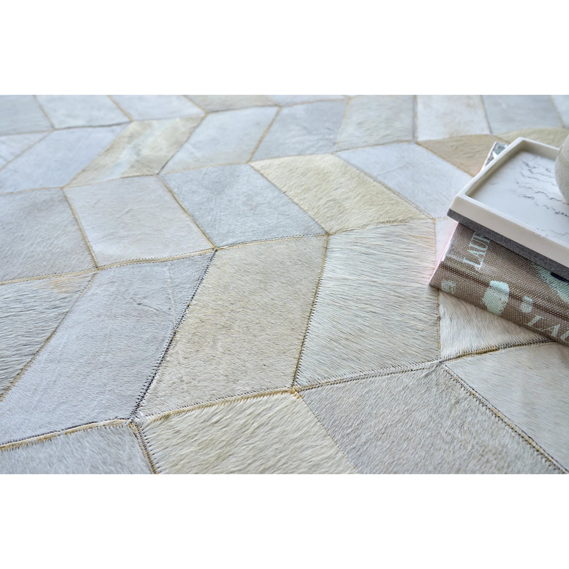 Natural Hide Rug by Exquisite Rugs in ivory. Made from leather hide in a unique style.