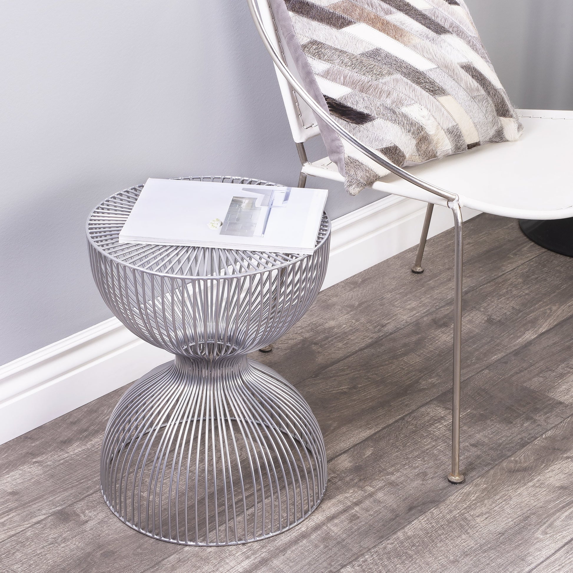 Nicholas End Table by Butler Specialty Company in metalworks. Made from iron in a modern style.