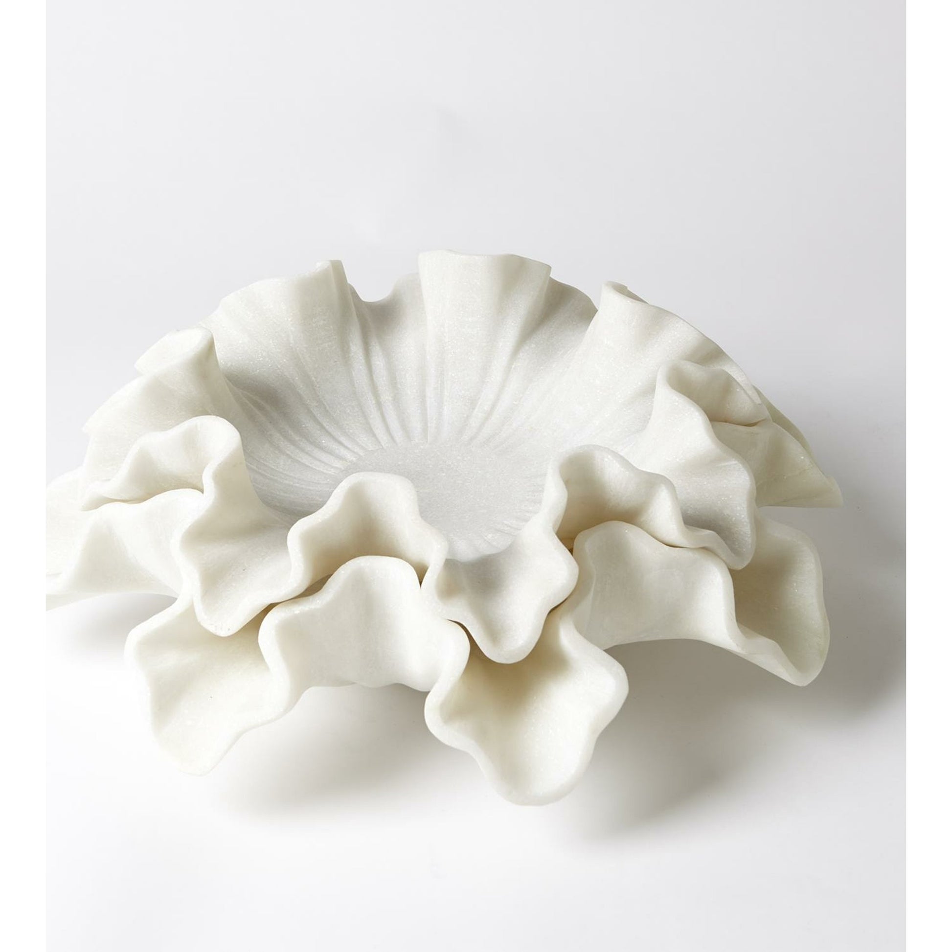 Marble Ruffle Bowl by Global Views in white. Made from rajnagar marble in a coastal style.