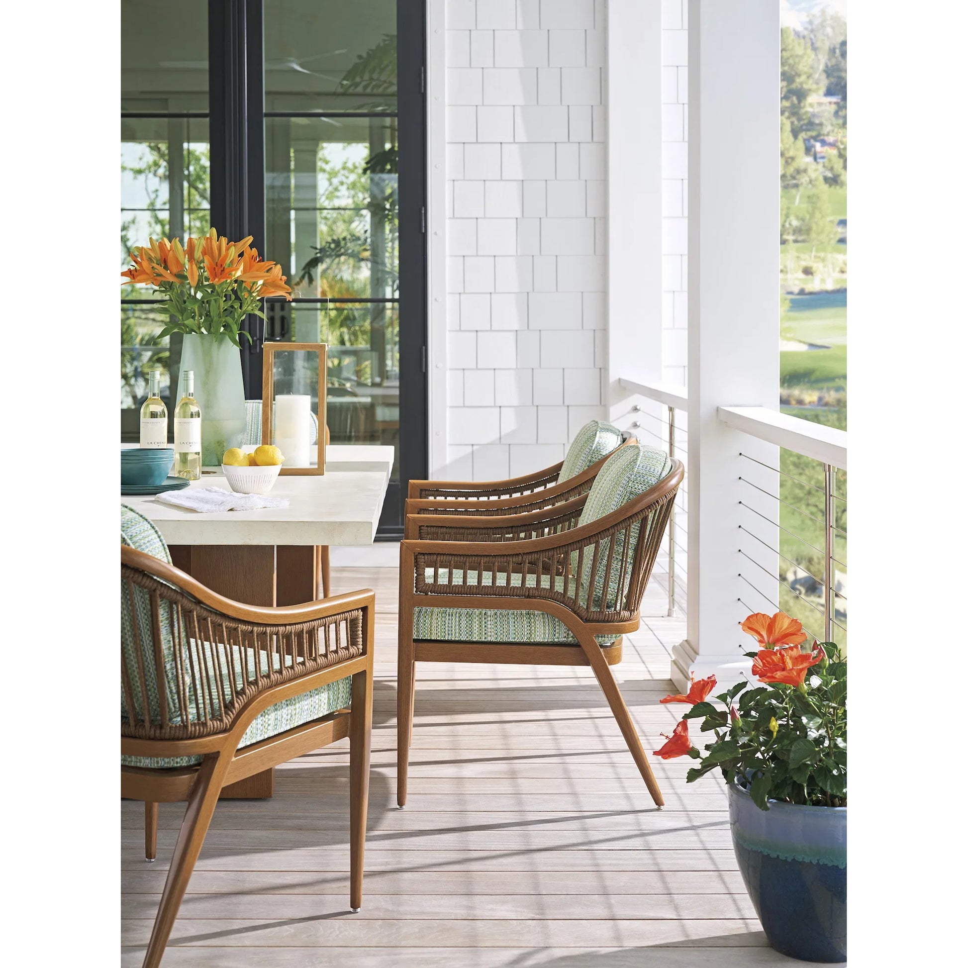 Palm Desert Poolside Arm Dining Chair by Tommy Bahama Outdoor in 3350 dark brown. Made from unique in a unique style.
