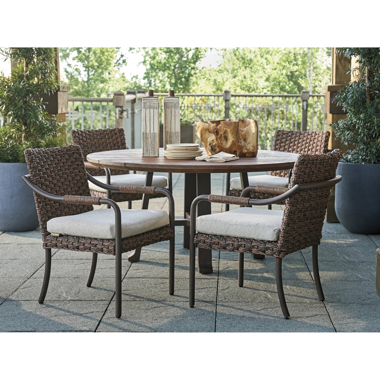 004 SI-2242608 | Lifestyle | Kilimanjaro Round Dining Table by Tommy Bahama Outdoor in tobacco. Made from unique in a rustic style.