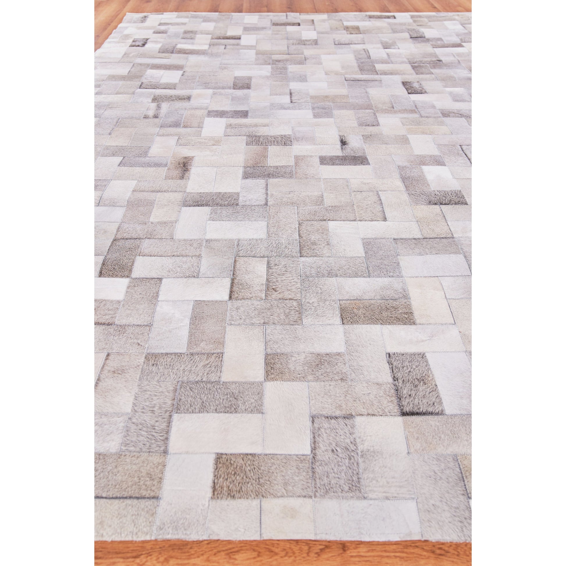 Natural Hide 3353 Rug by Exquisite Rugs in silver. Made from leather hide in a unique style.