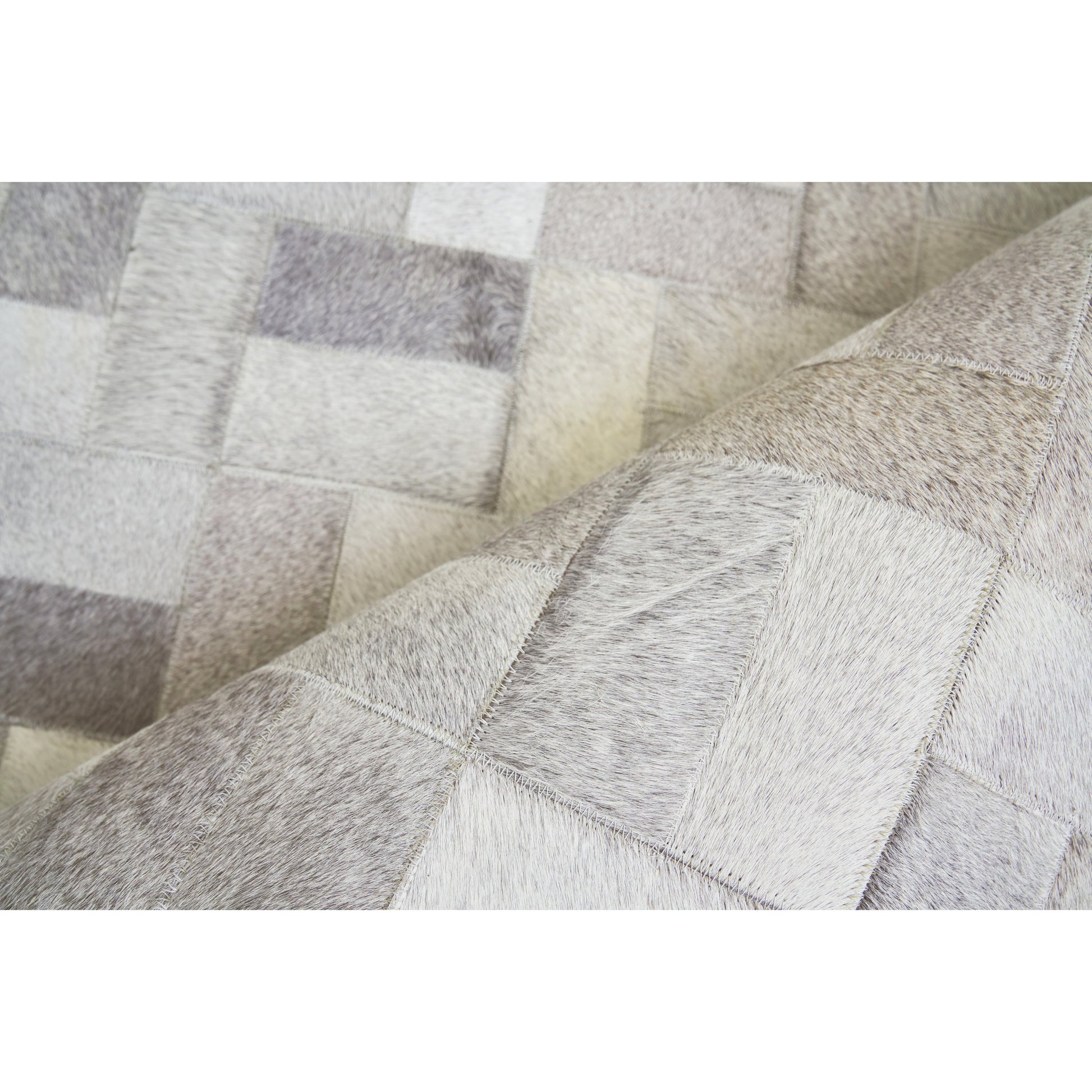 Natural Hide 3353 Rug by Exquisite Rugs in silver. Made from leather hide in a unique style.