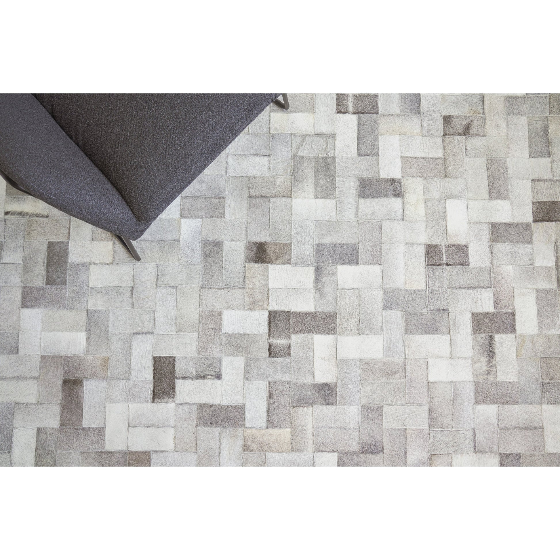 Natural Hide 3353 Rug by Exquisite Rugs in silver. Made from leather hide in a unique style.