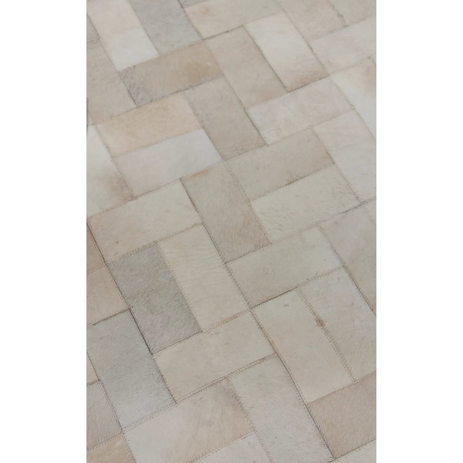 Natural Hide 3354 Rug by Exquisite Rugs in ivory, multi. Made from leather hide in a unique style.