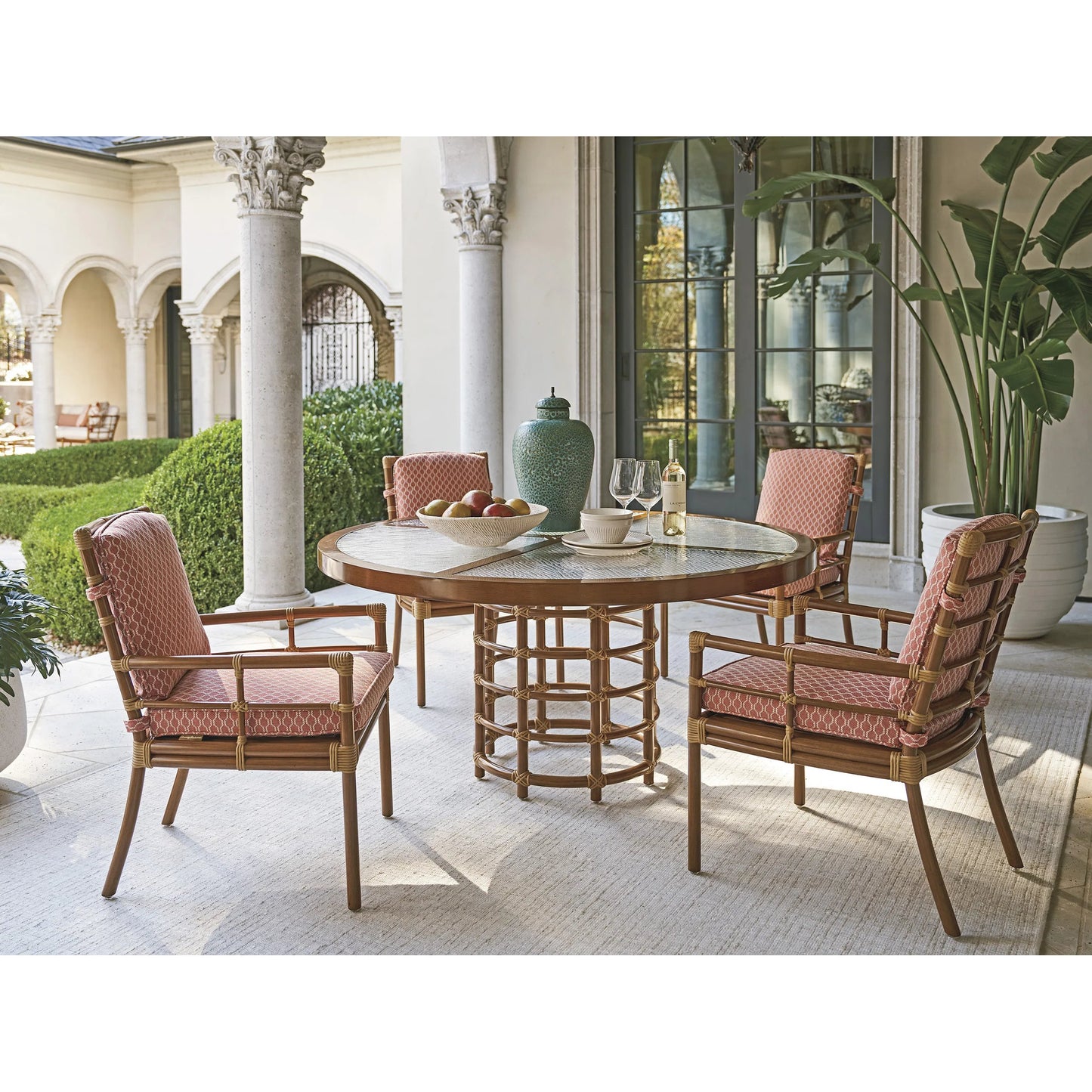 004 SI-2242627 | Lifestyle | Sandpiper Bay Outdoor Round Dining Table by Tommy Bahama Outdoor in natural. Made from unique in a rustic style.