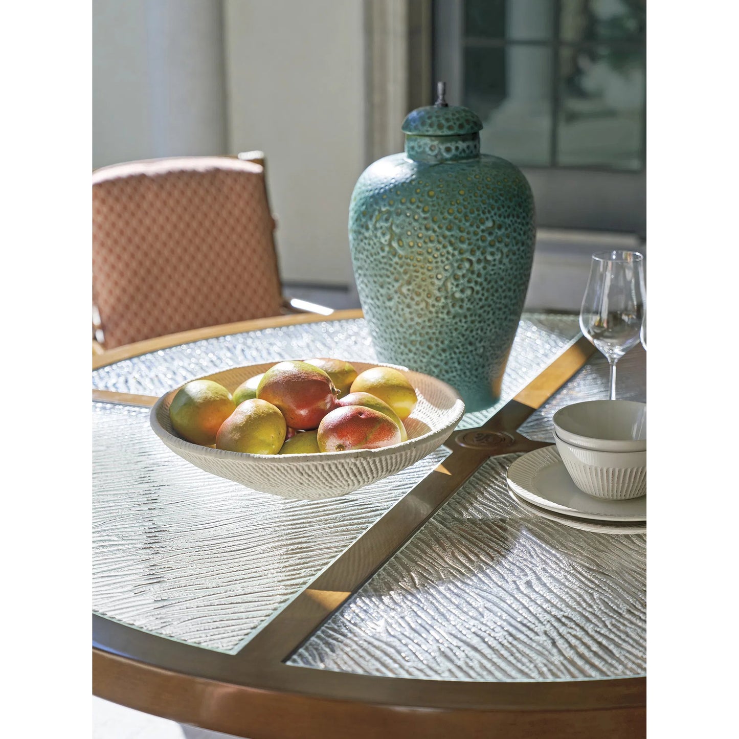002 SI-2242627 | Closeup | Sandpiper Bay Outdoor Round Dining Table by Tommy Bahama Outdoor in natural. Made from unique in a rustic style.