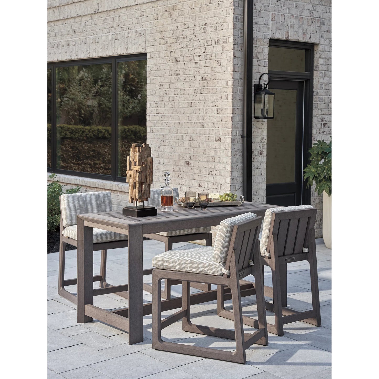 003 SI-2242646 | Lifestyle | Mozambique Bistro Table by Tommy Bahama Outdoor in taupe gray. Made from unique in a transitional style.
