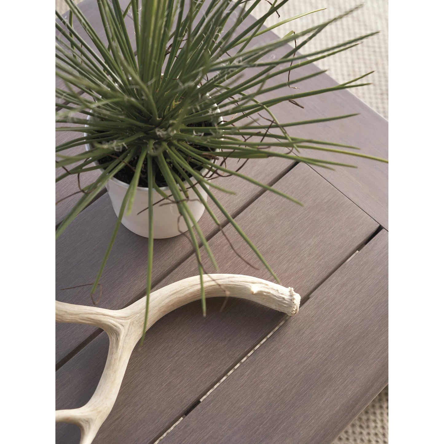000 SI-2242648 | Closeup | Mozambique Rectangular Cocktail Table by Tommy Bahama Outdoor in taupe gray. Made from unique in a transitional style.