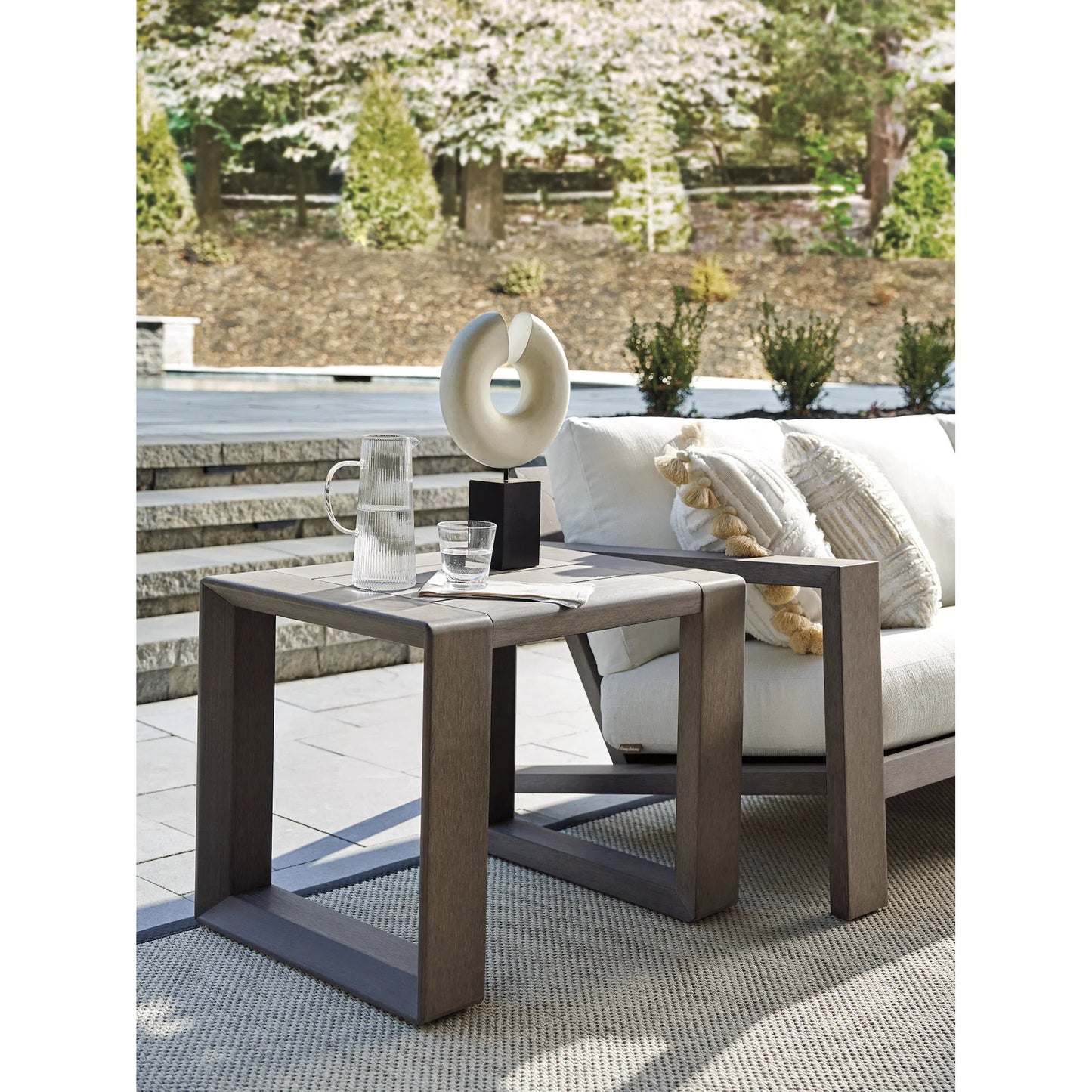 004 SI-2242651 | Lifestyle | Mozambique Rectangular End Table by Tommy Bahama Outdoor. Made from unique in a transitional style.