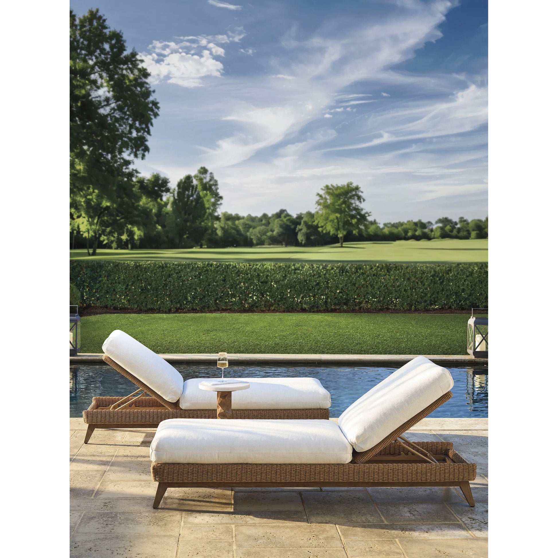 Isle of Palms Chaise Lounge by Tommy Bahama Outdoor in white, ivory and brown. Made from teak, rattan, fabric in a unique style.
