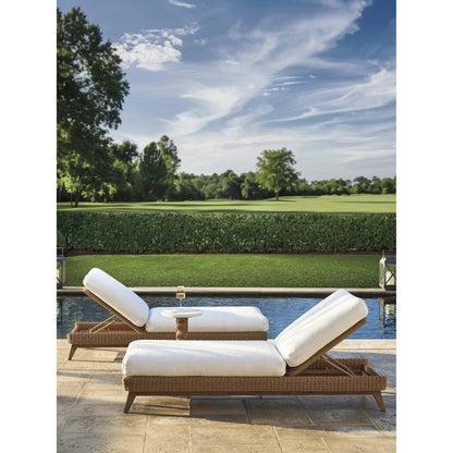 Isle of Palms Chaise Lounge by Tommy Bahama Outdoor in white, ivory and brown. Made from teak, rattan, fabric in a unique style.