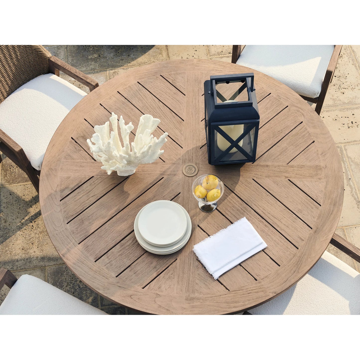004 SI-2540654 | Closeup | Isle of Palms Round Dining Table by Tommy Bahama Outdoor in brown. Made from teak in a unique style.