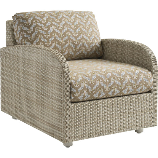 Sand Dune Lounge Chair by Tommy Bahama Outdoor in tan. Made from all-weather wicker in a unique style.
