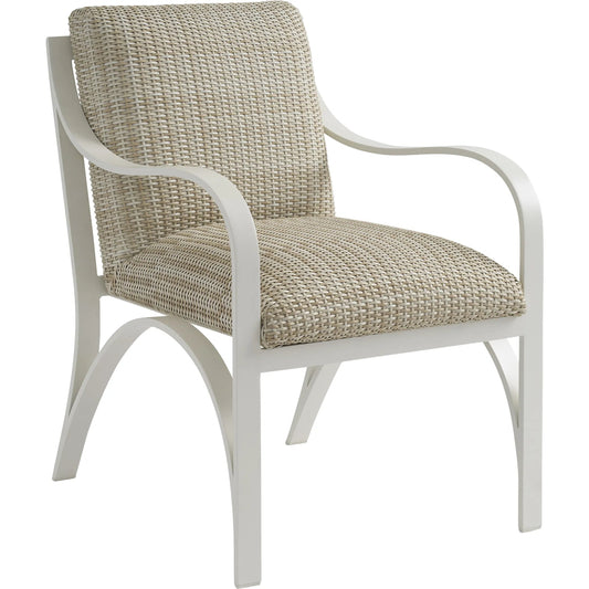 Sand Dune Arm Dining Chair by Tommy Bahama Outdoor in tan and white. Made from all-weather wicker. aluminum in a unique style.