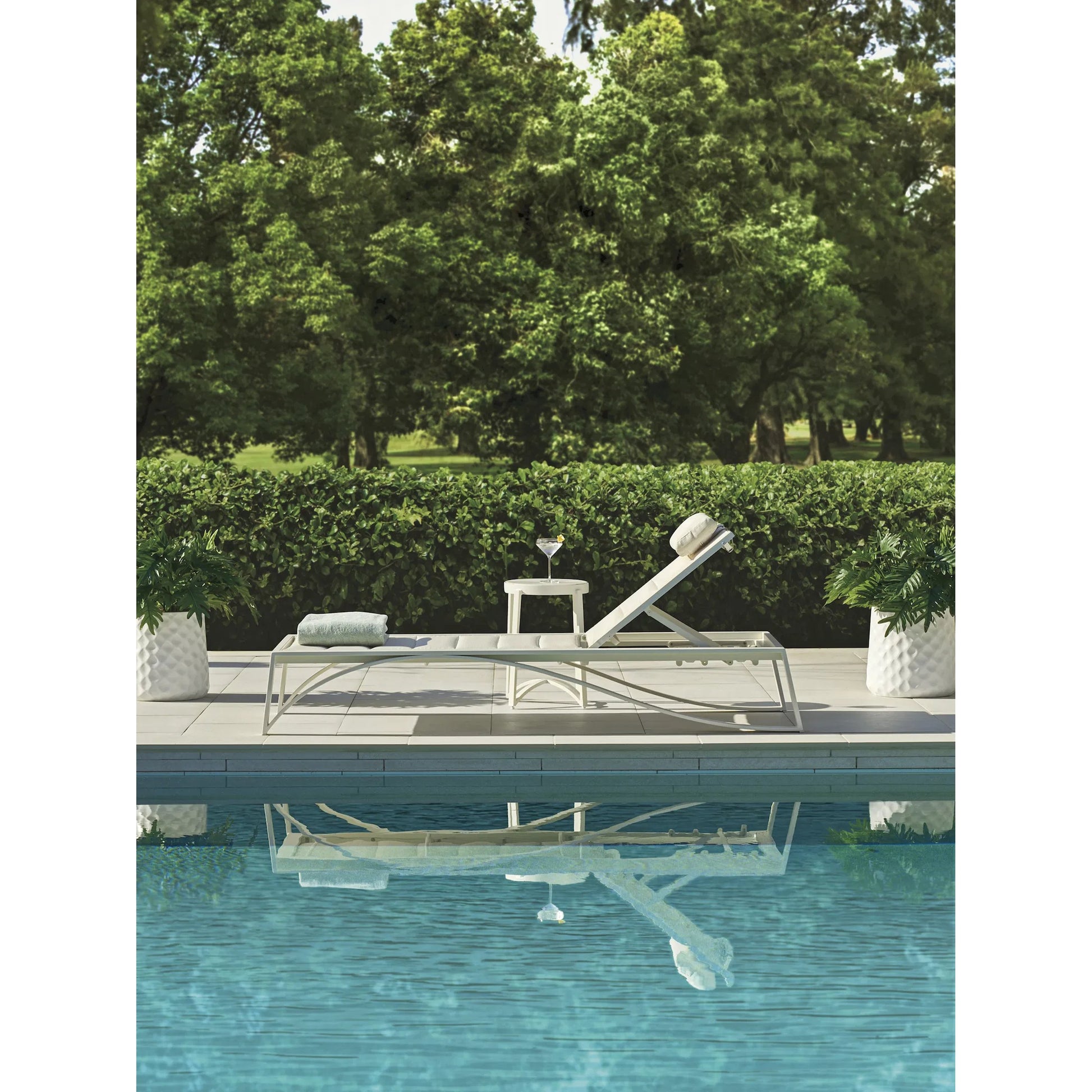 Sand Dune Chaise by Tommy Bahama Outdoor in white. Made from all-weather wicker, aluminum in a unique style.