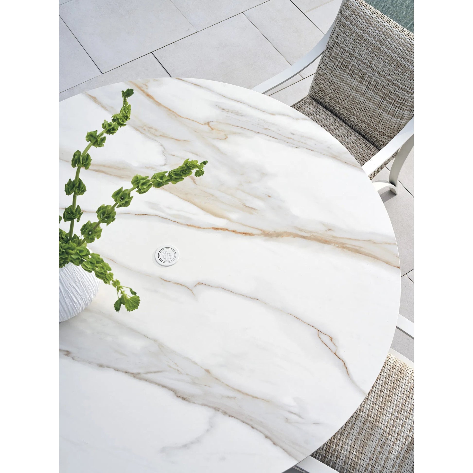 Sand Dune Round Dining Table by Tommy Bahama Outdoor in white. Made from stone, aluminum in a unique style.