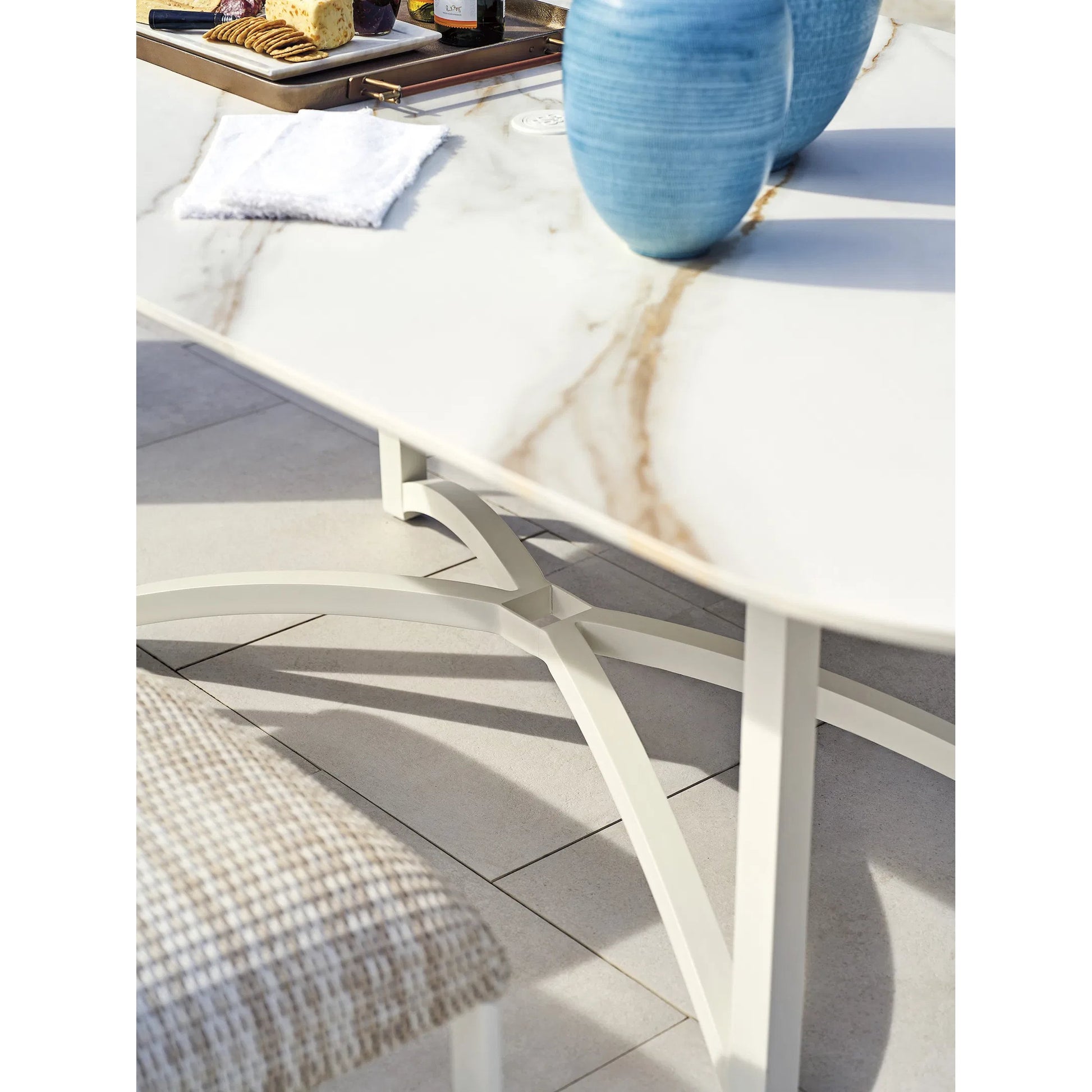 Sand Dune Rectangular Dining Table by Tommy Bahama Outdoor in white. Made from stone, aluminum in a unique style.
