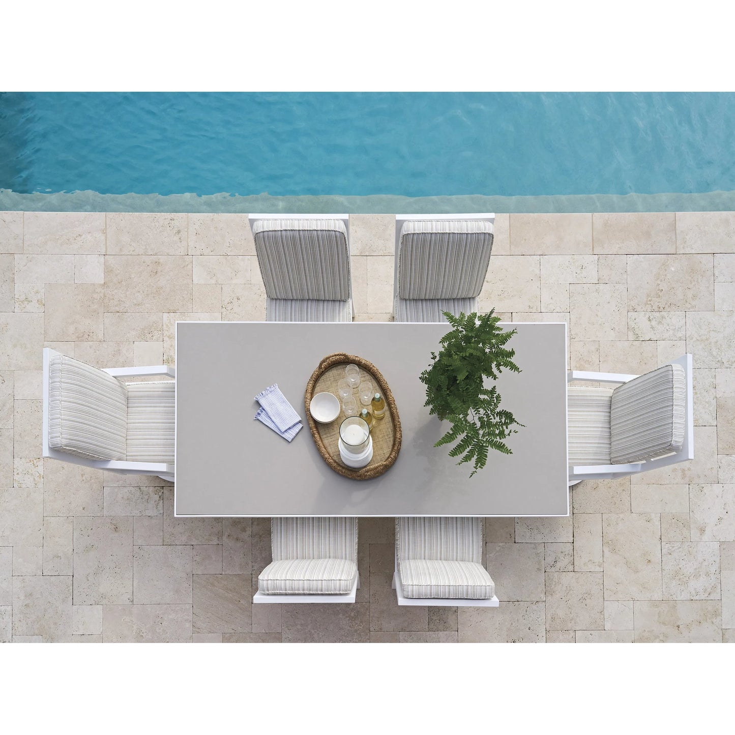 003 SI-2540687 | Lifestyle | Island Classic Rectangular Dining Table by Tommy Bahama Outdoor in white. Made from quartz, aluminum, fabric in a unique style.