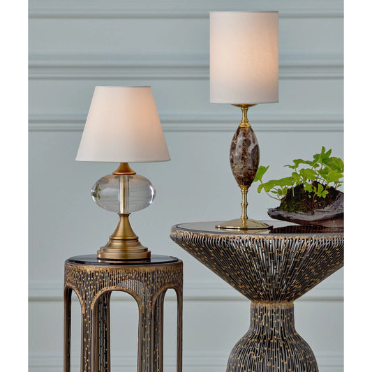 Sashay Cordless Table Lamp by Currey and Company in clear, polished antique brass. Made from optic crystal, metal in a eclectic & global style.