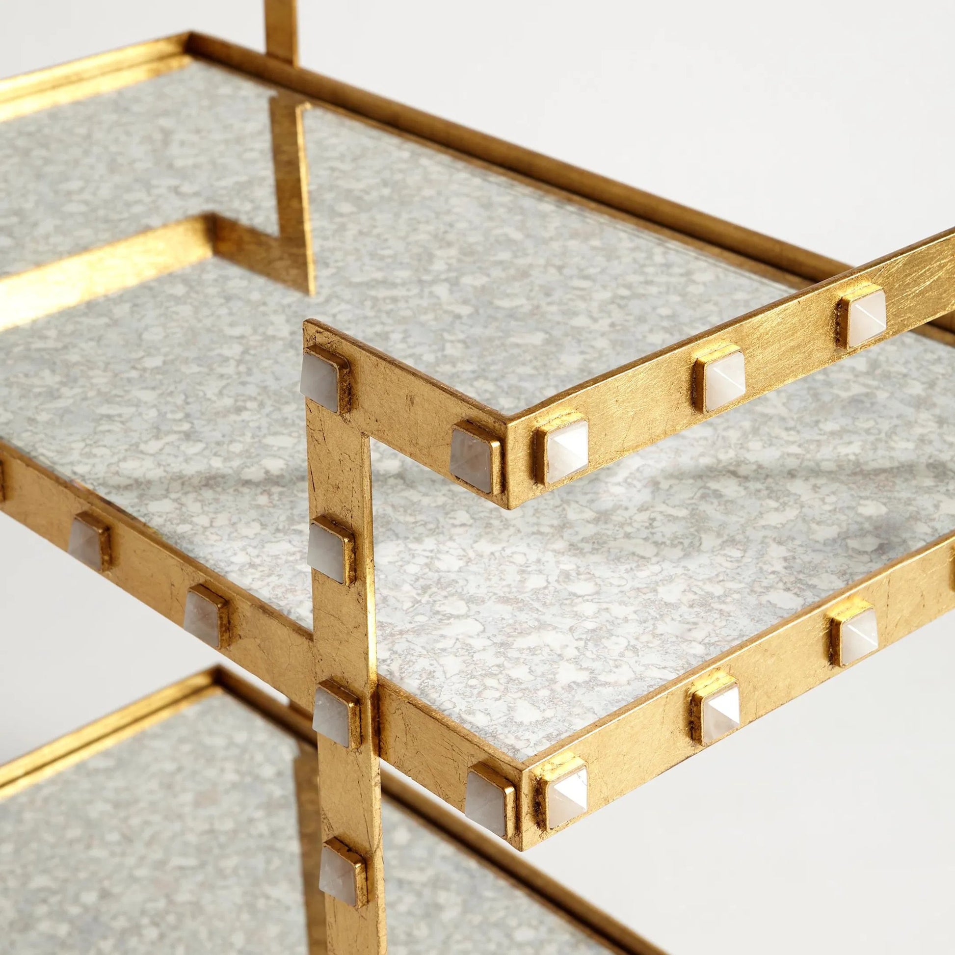Quartz Stud Bar Cart by Global Views in gold leaf. Made from steel, quartz, mdf in a unique style.