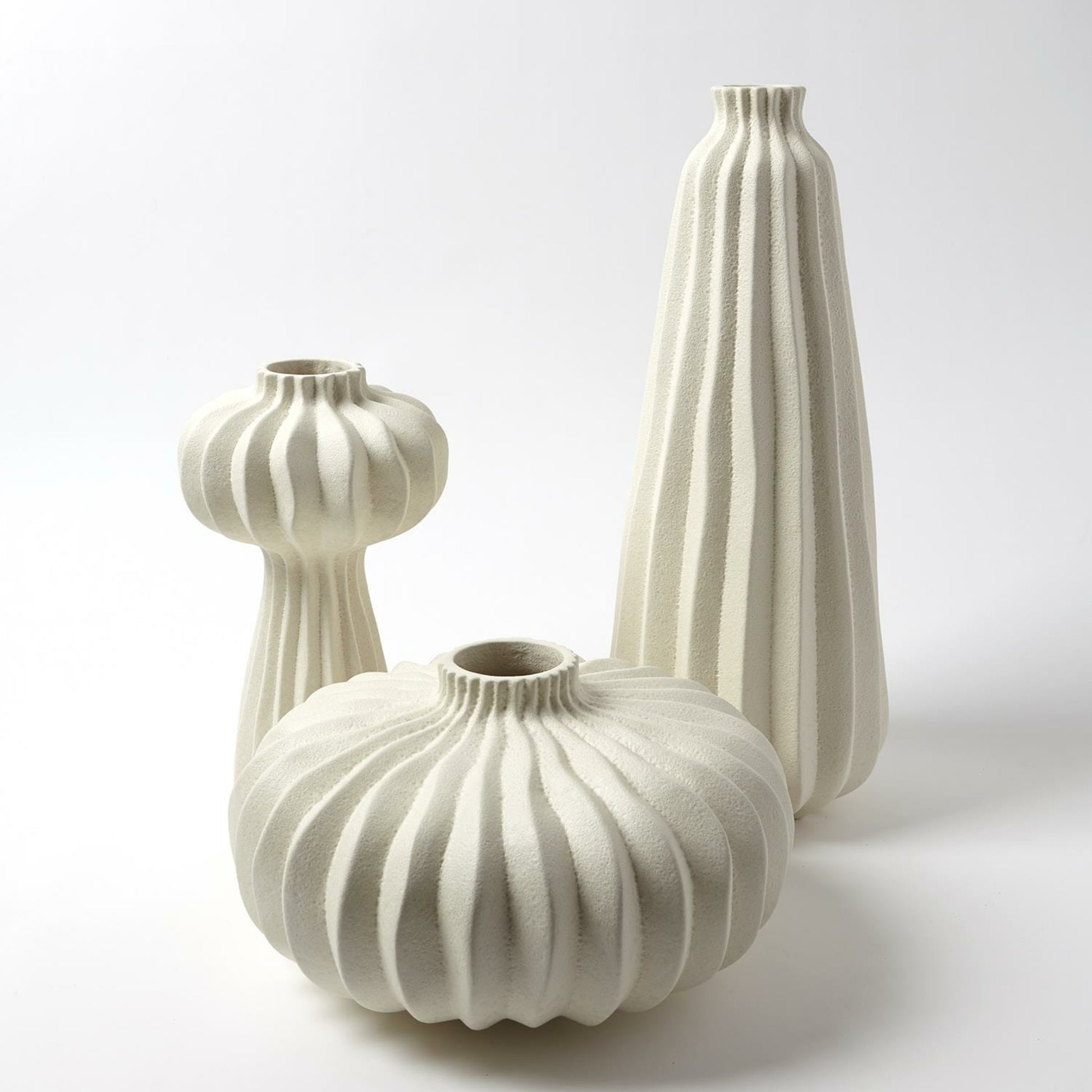 Lithos Vase by Global Views. Made from ceramic in a coastal style.