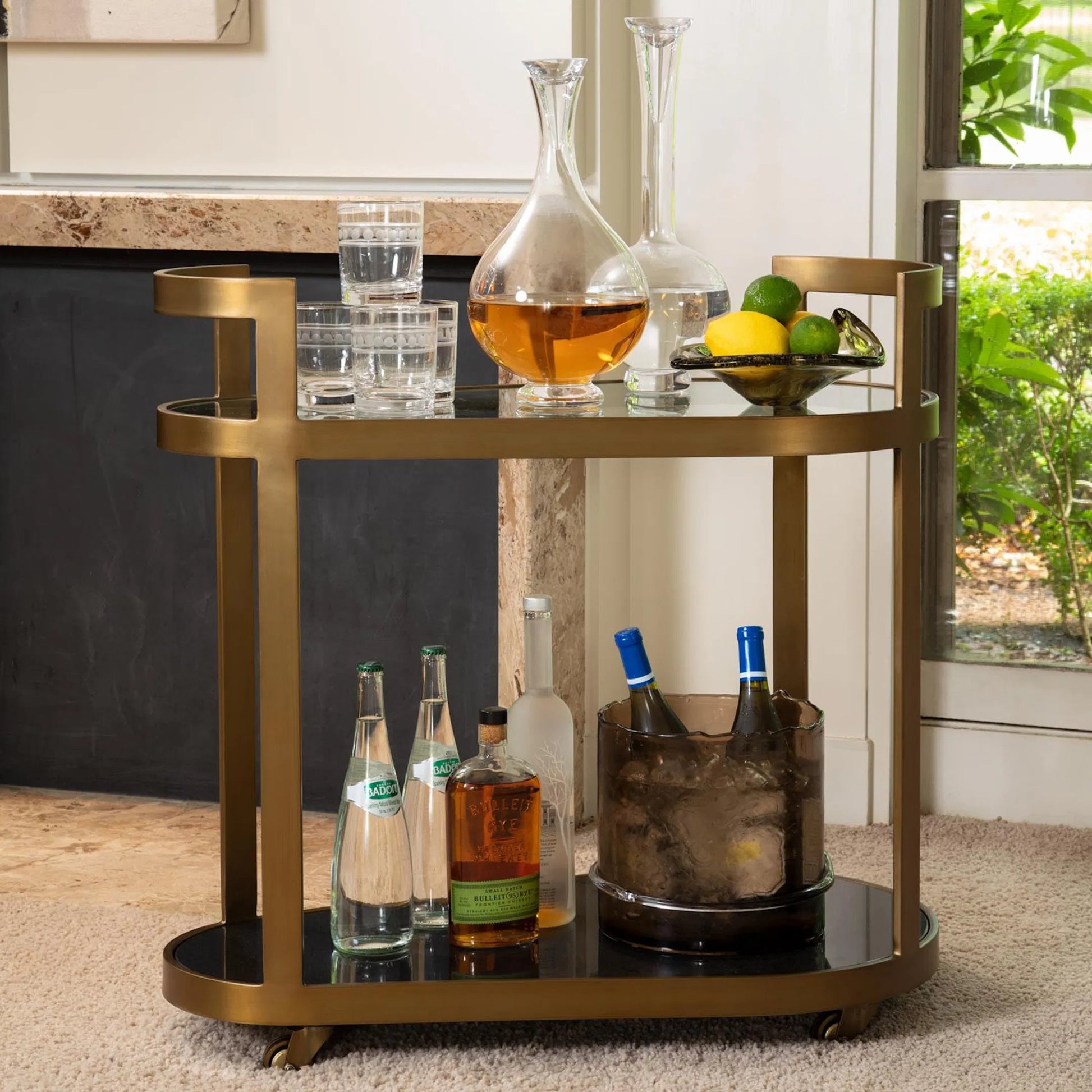 Regan Bar by Global Views. Made from iron, tempered glass, granite in a transitional style.