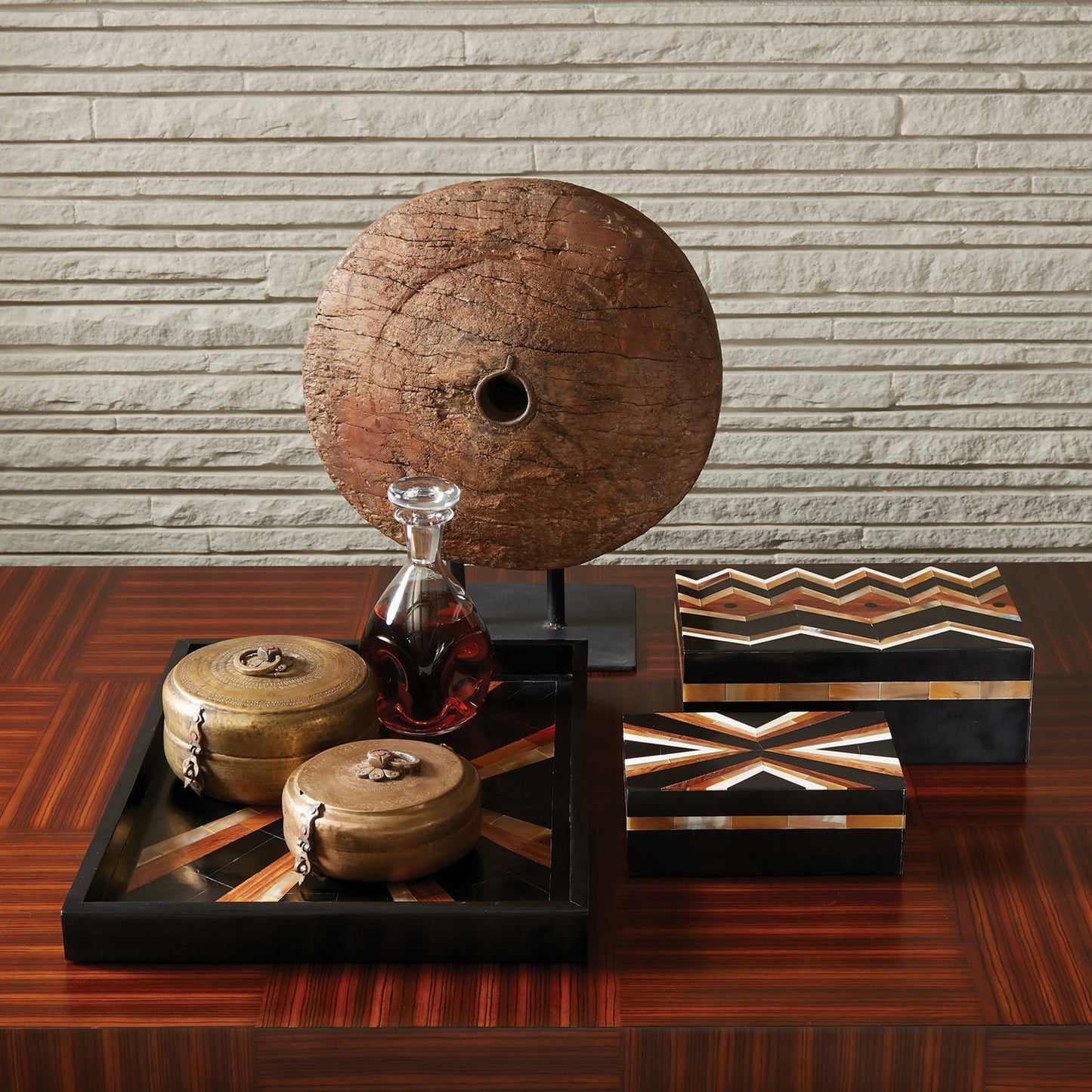 002 SR-891245 | Lifestyle | Antique Cart Wheel on Stand by Global Views. Made from teak in a eclectic & global style.