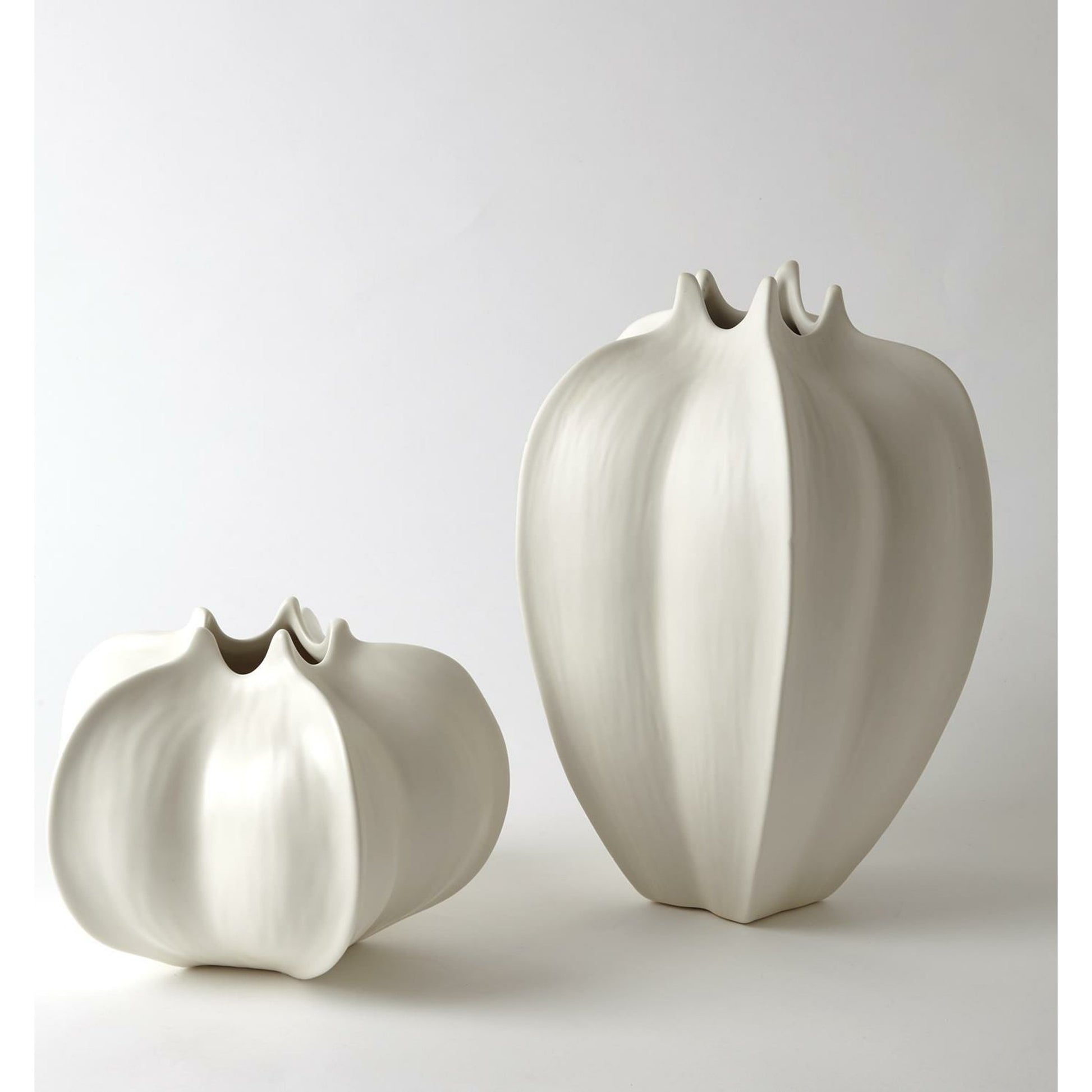 Star Fruit Vase by Global Views. Made from ceramic in a coastal style.