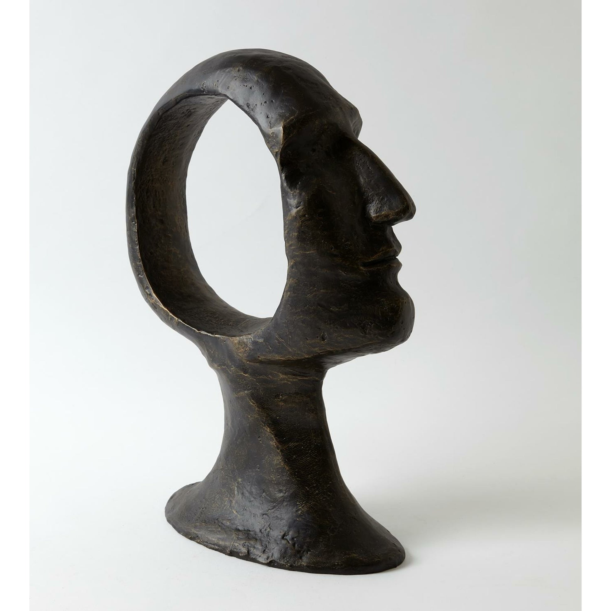 Hollow Head Man by Global Views in bronze. Made from iron in a eclectic & global style.