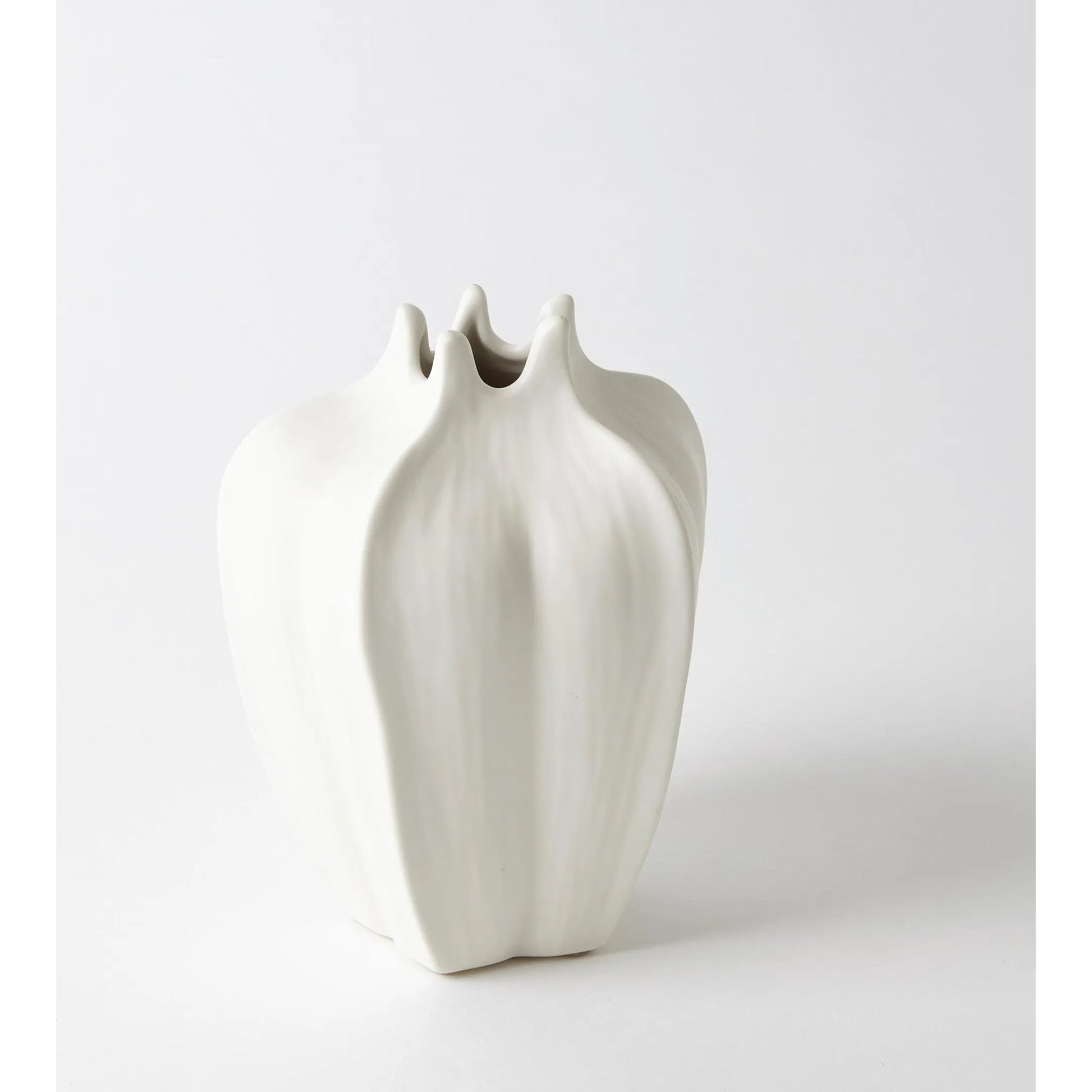 Star Fruit Vase by Global Views. Made from ceramic in a coastal style.