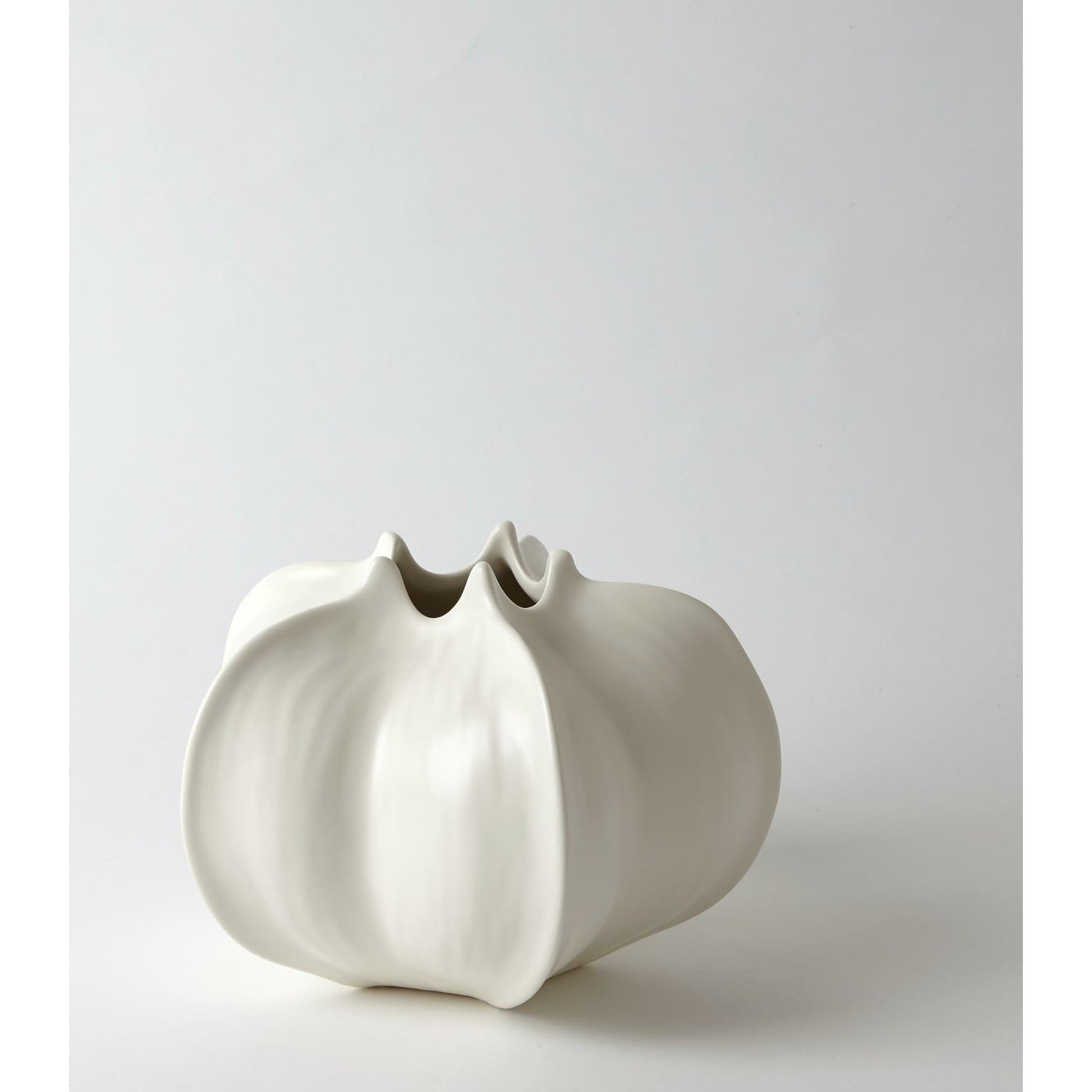 Star Fruit Vase by Global Views. Made from ceramic in a coastal style.