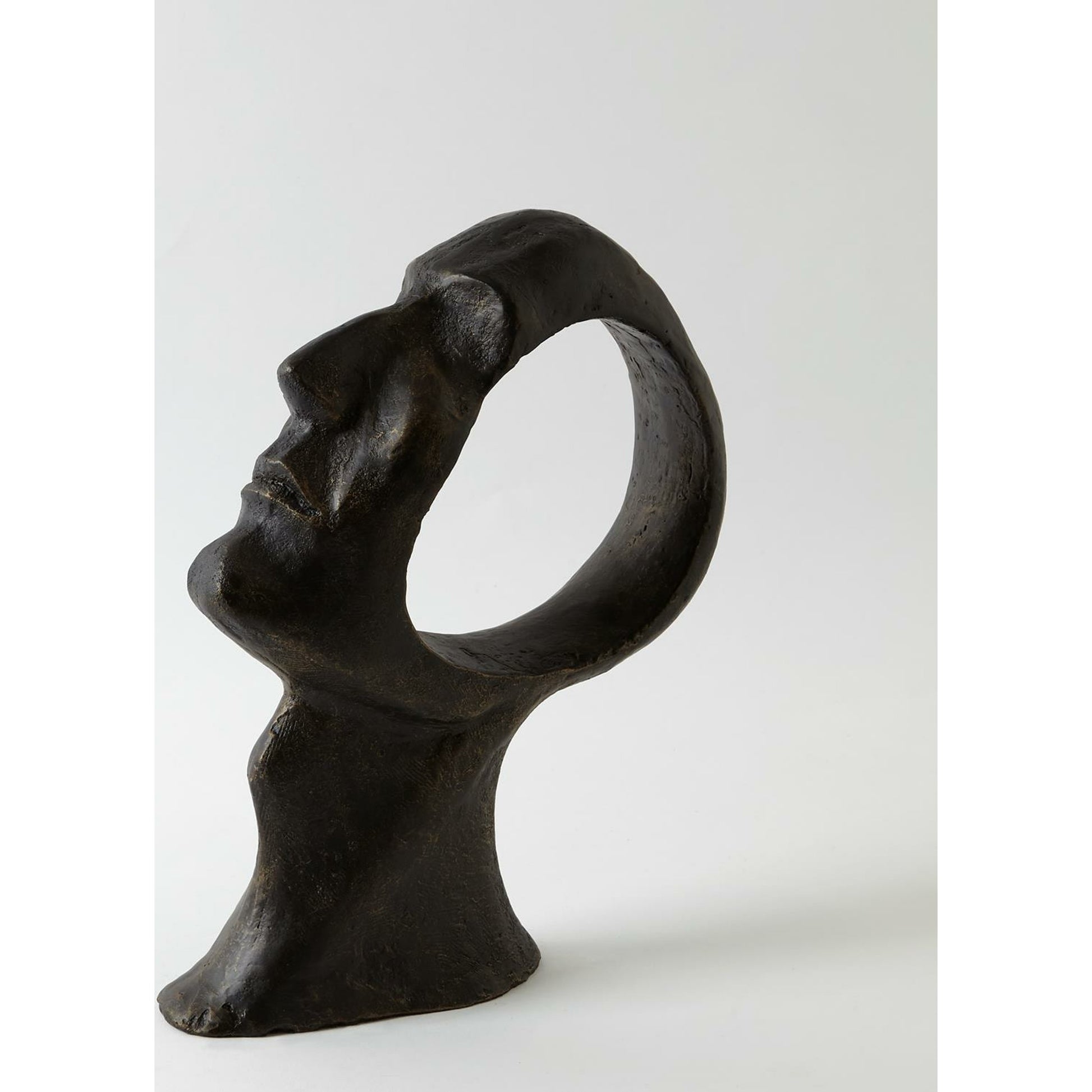 Hollow Head Man by Global Views in bronze. Made from iron in a eclectic & global style.