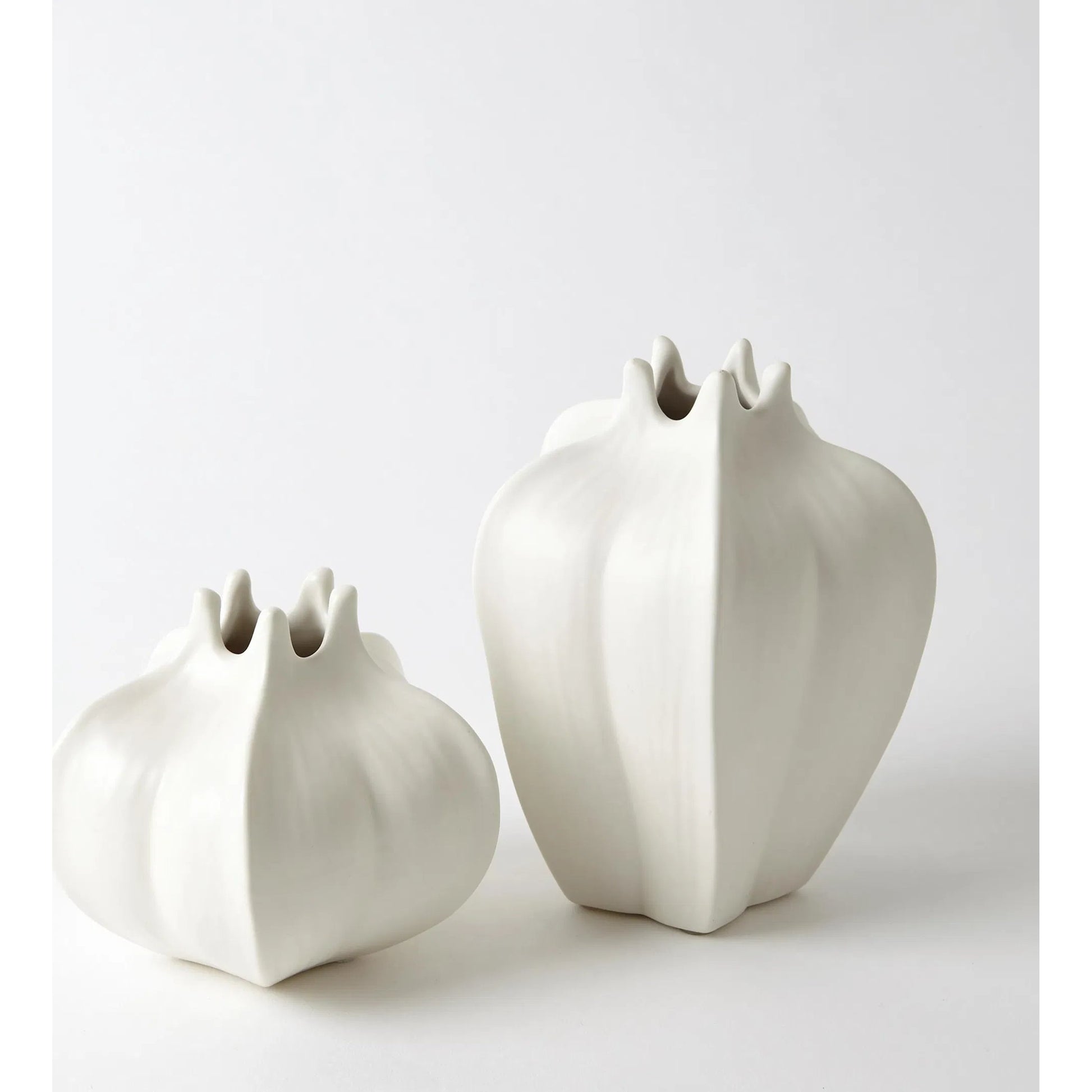 Star Fruit Vase by Global Views. Made from ceramic in a coastal style.