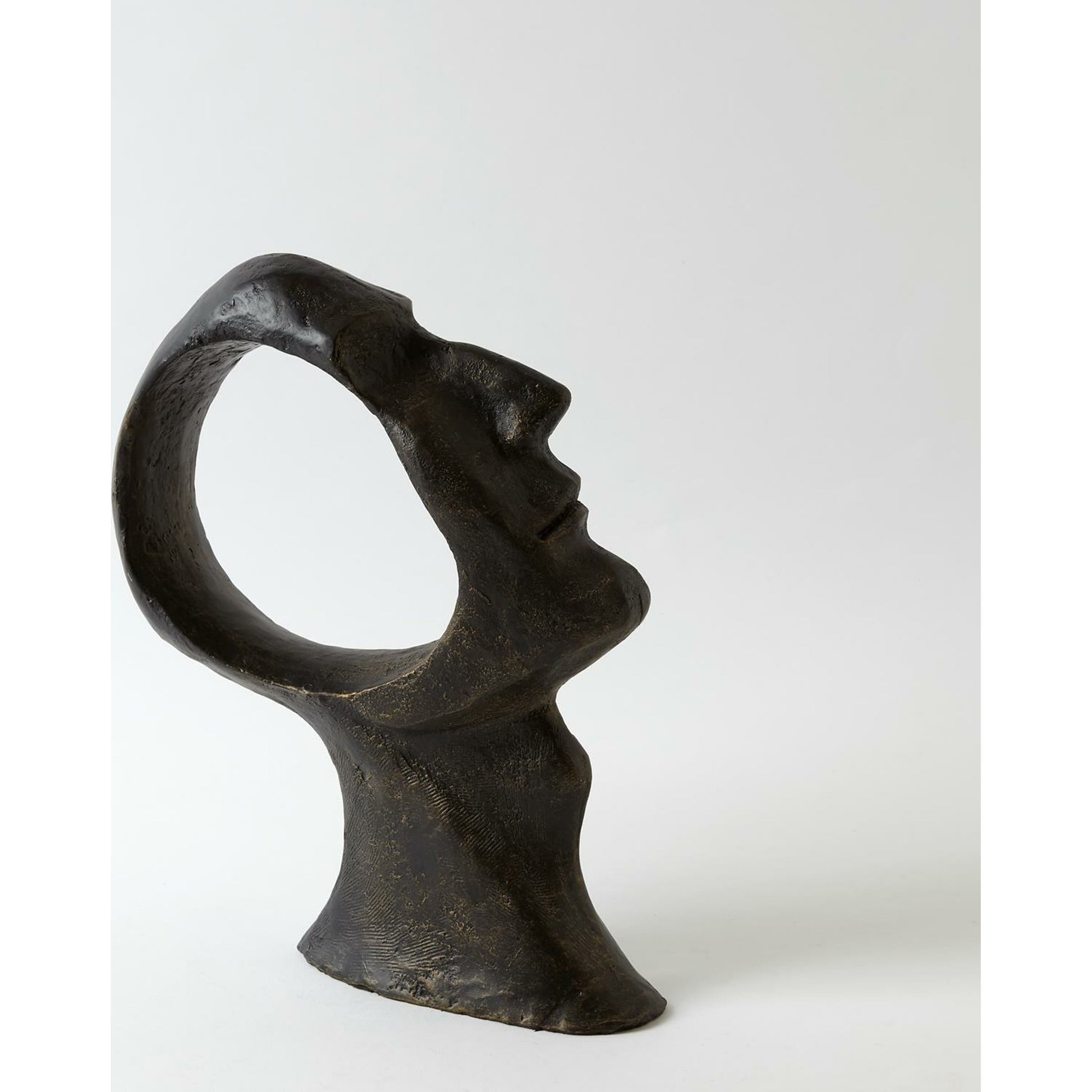 Hollow Head Man by Global Views in bronze. Made from iron in a eclectic & global style.