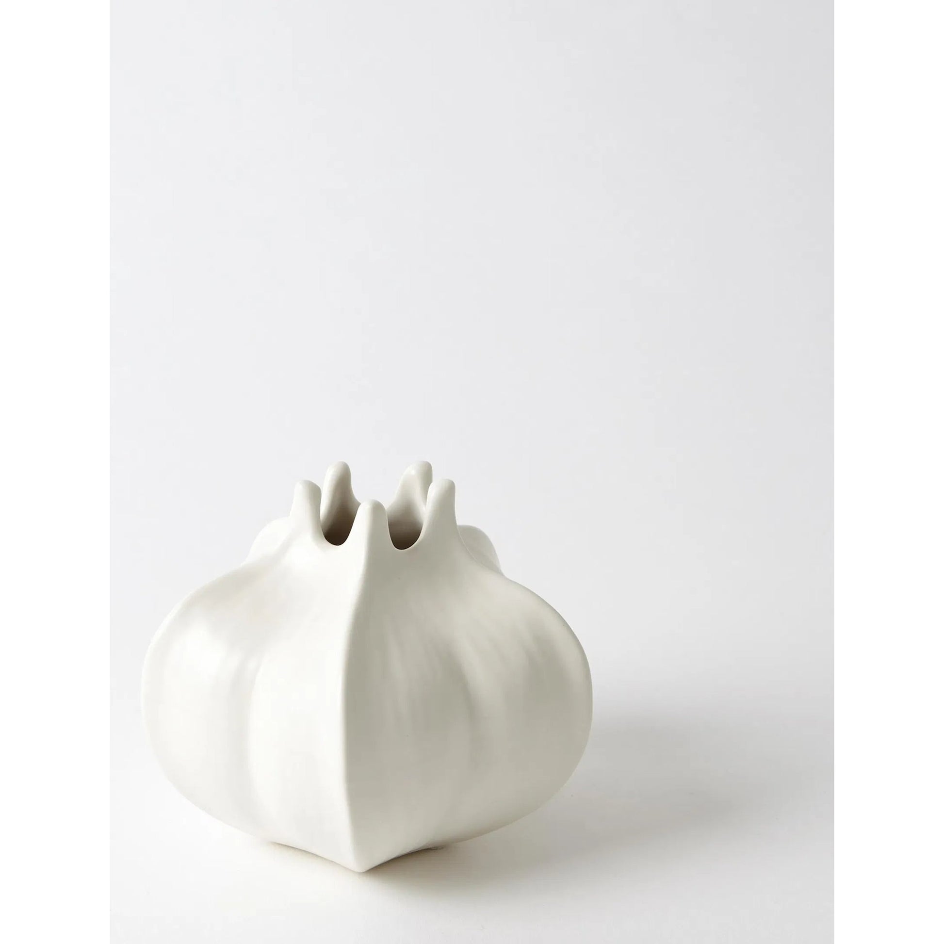 Star Fruit Vase by Global Views. Made from ceramic in a coastal style.