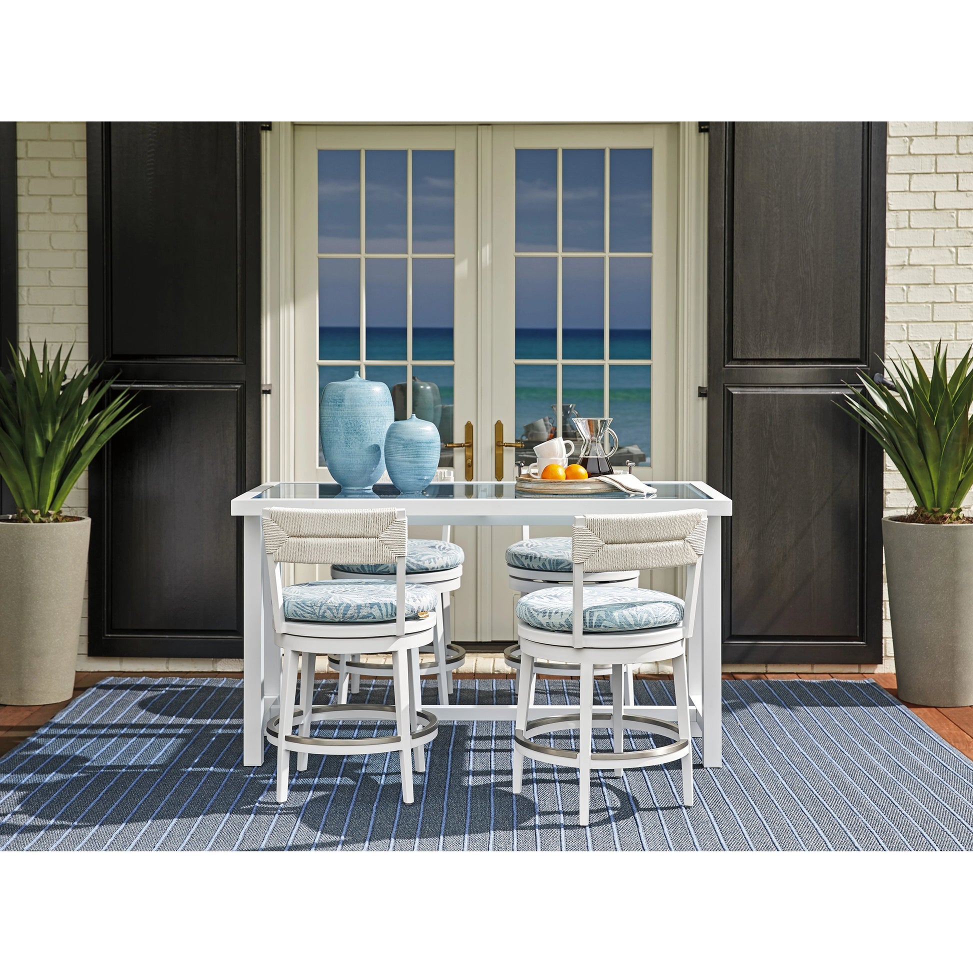Ocean Breeze Promenade Bistro Table by Tommy Bahama Outdoor in pearl white. Made from unique in a modern style.