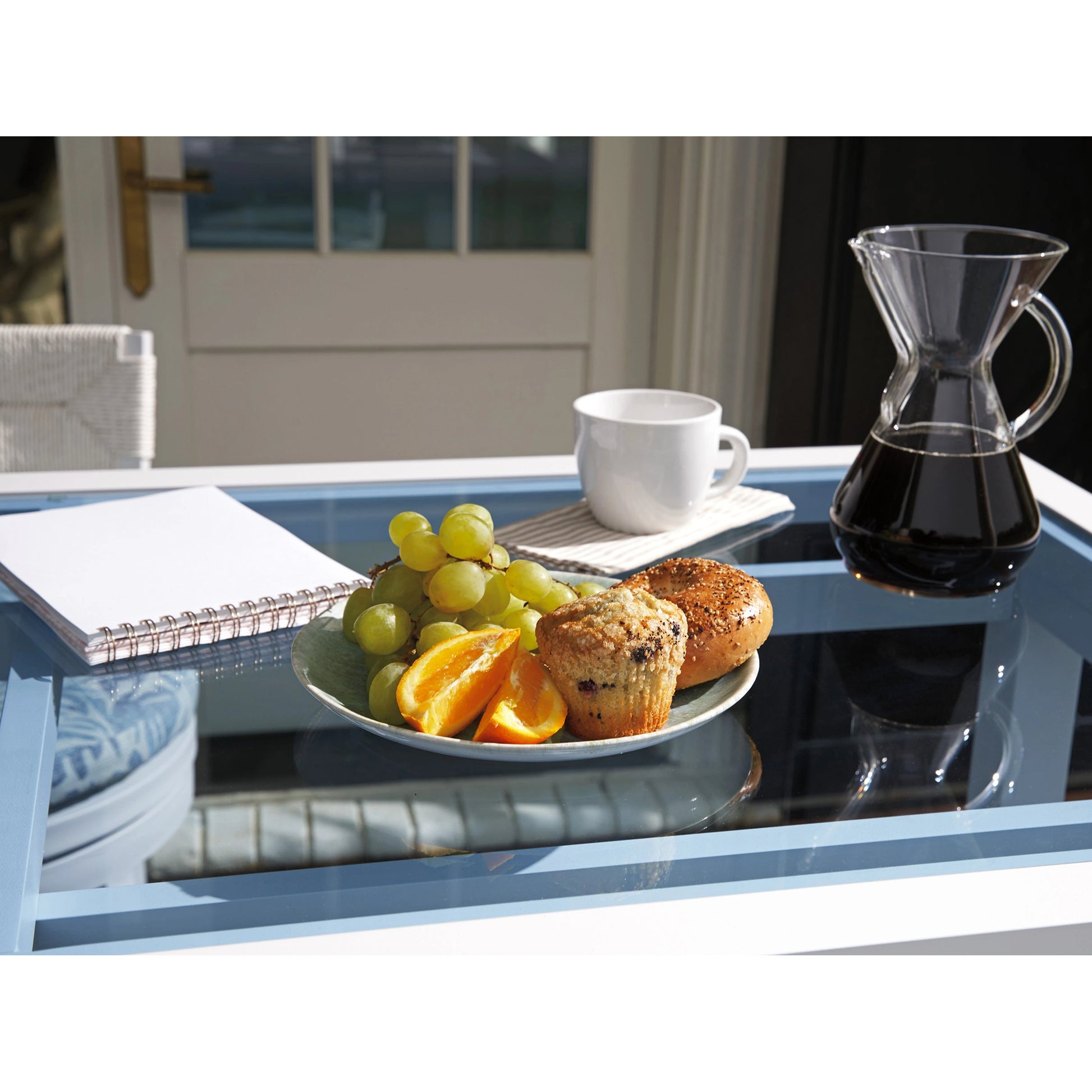 Ocean Breeze Promenade Bistro Table by Tommy Bahama Outdoor in pearl white. Made from unique in a modern style.