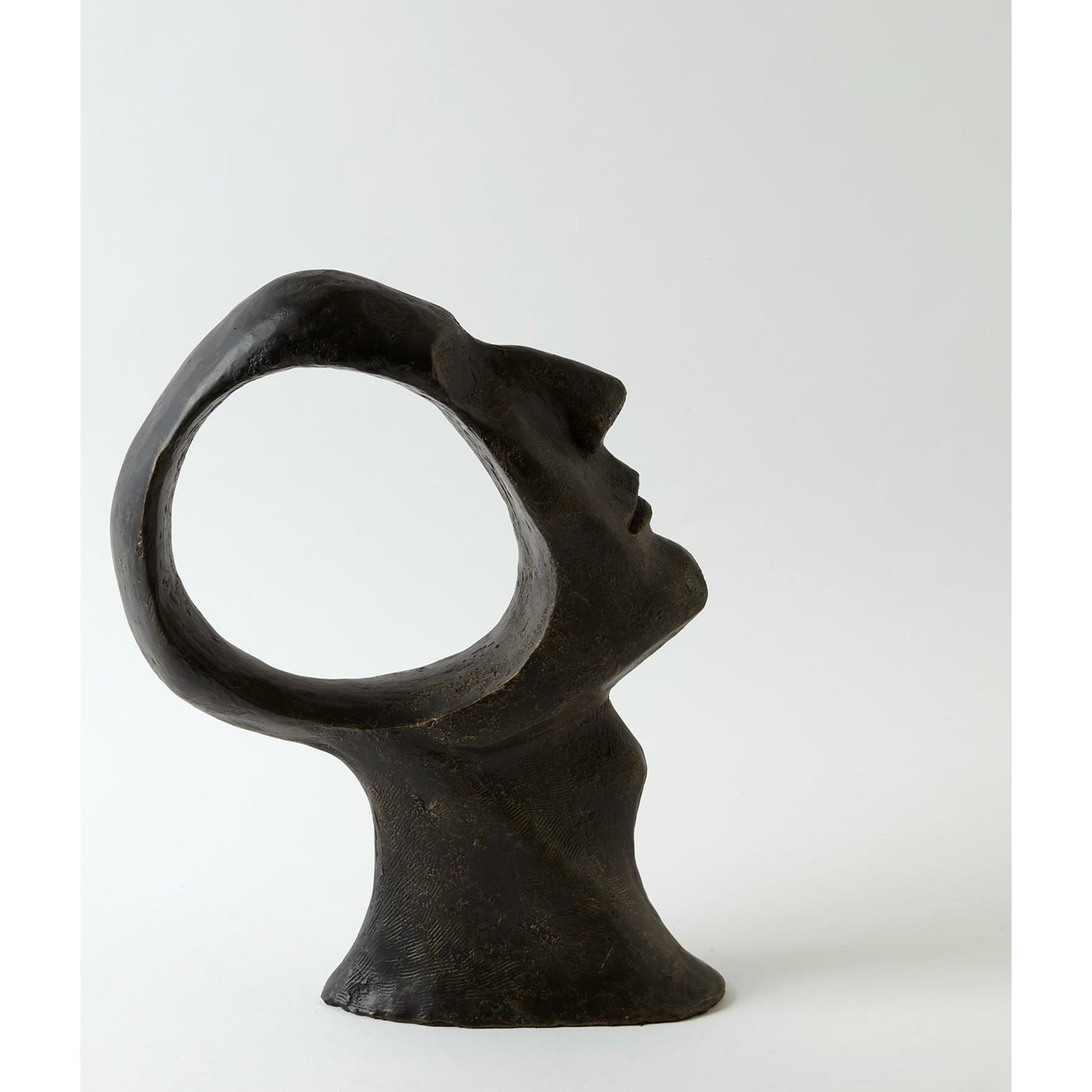Hollow Head Man by Global Views in bronze. Made from iron in a eclectic & global style.