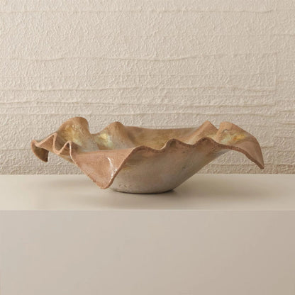 Folded Ripple Bowl by Global Views in raku. Made from ceramic in a eclectic & global style.