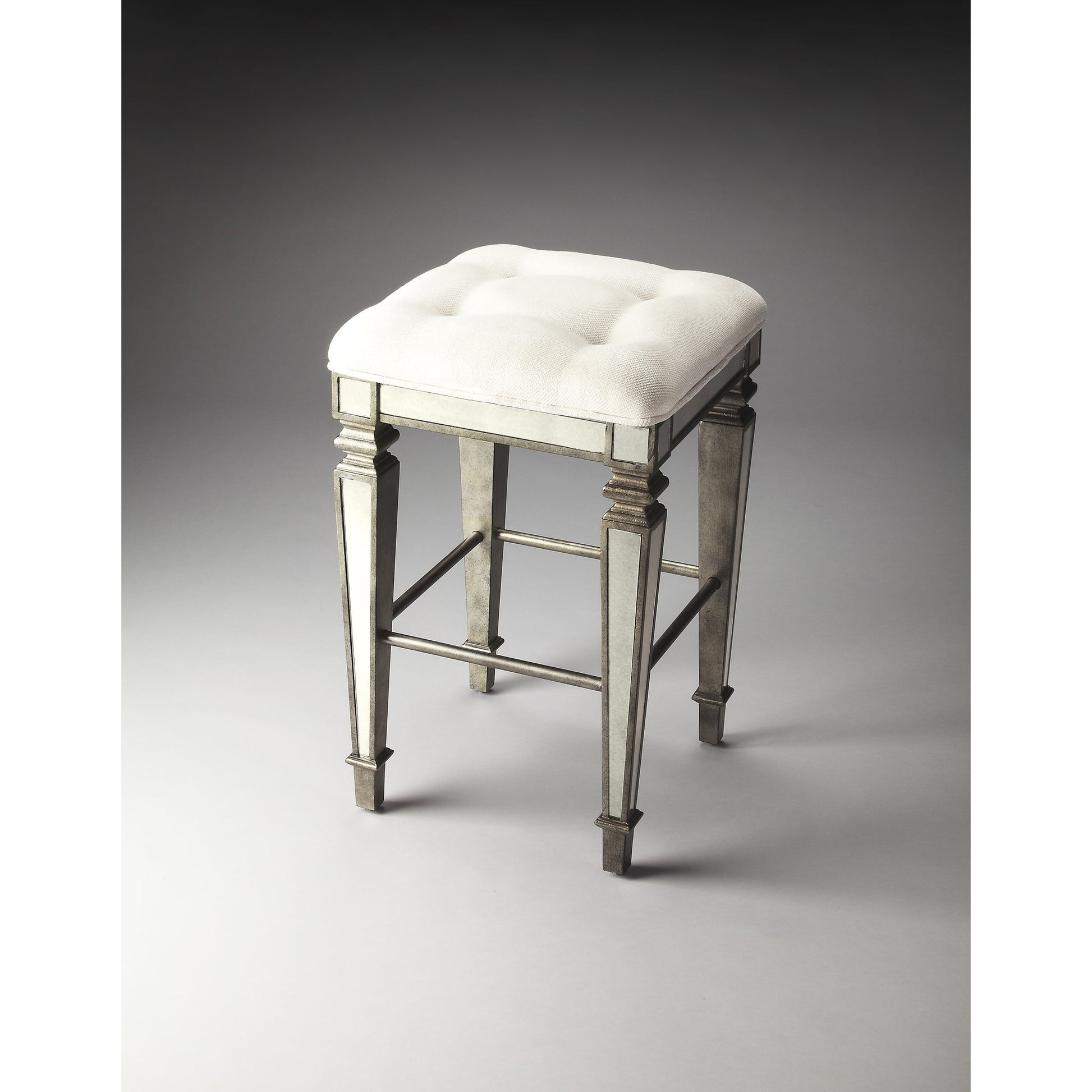 Celeste Mirrored Bar Stool by Butler Specialty Company in silver and mirror. Made from poplar solids, mdf, urethane foam cotton in a modern style.