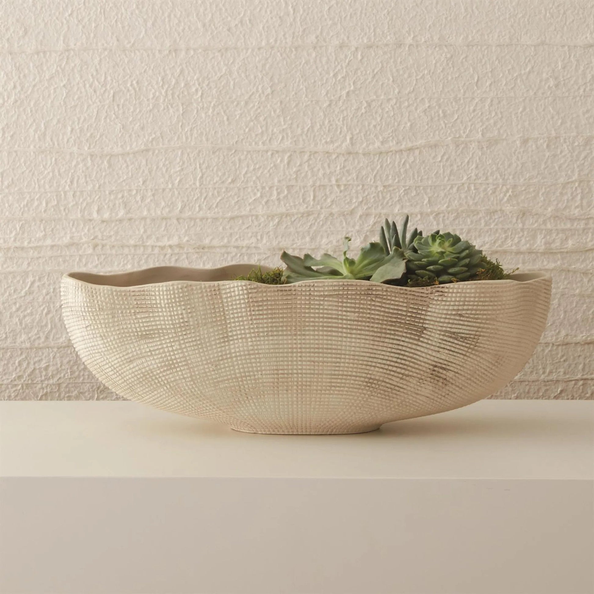 Sisal Oval Bowl by Global Views. Made from ceramic in a coastal style.